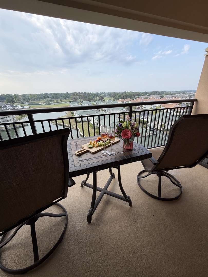 Your private balcony offers sweeping views over the landscape, with comfortable seating where you can savor morning coffee or evening wine.