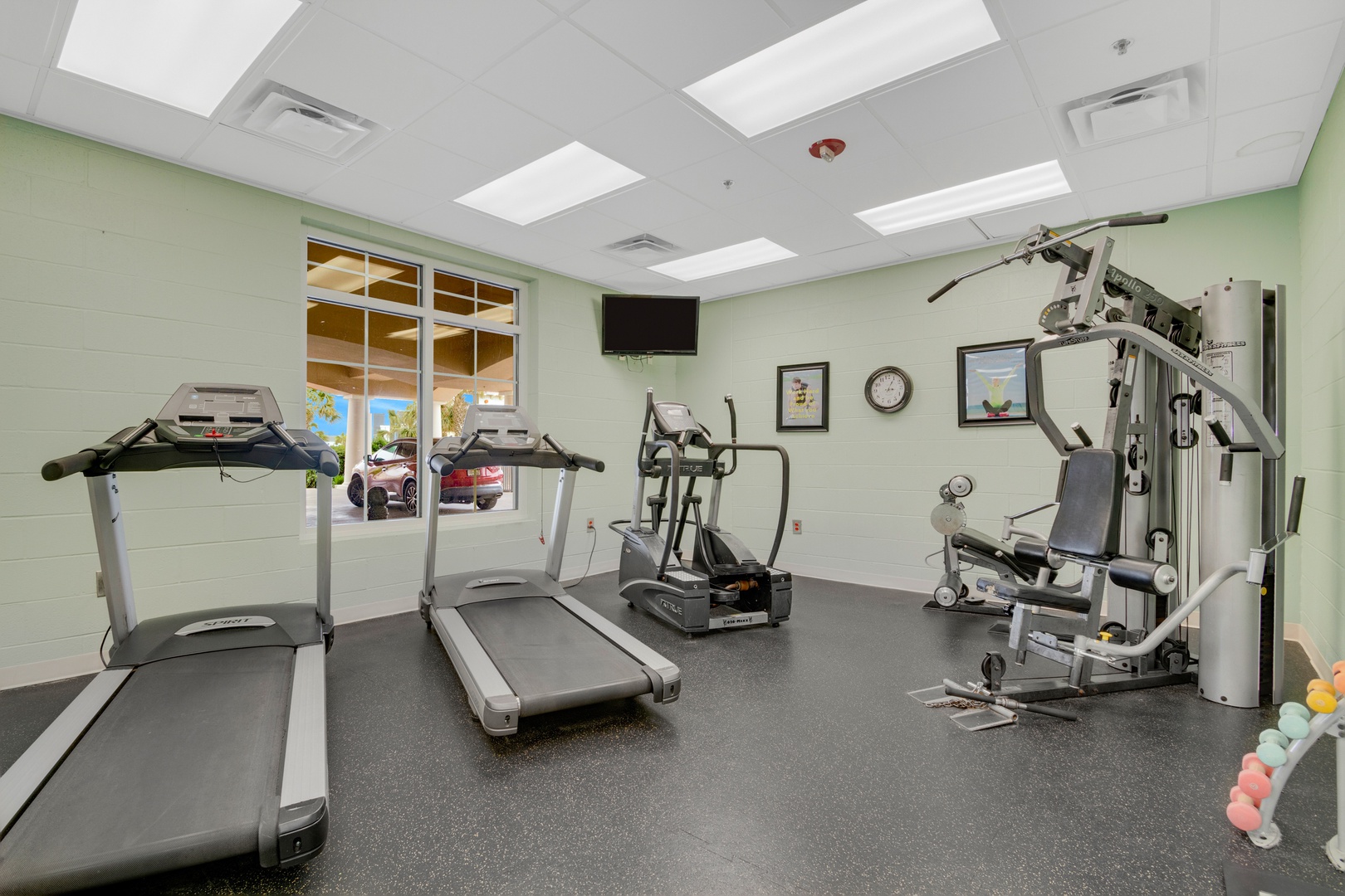 Keep up your fitness routine with cardio and strength equipment. Natural light from skylights brightens your workout in this well-equipped on-site gym.