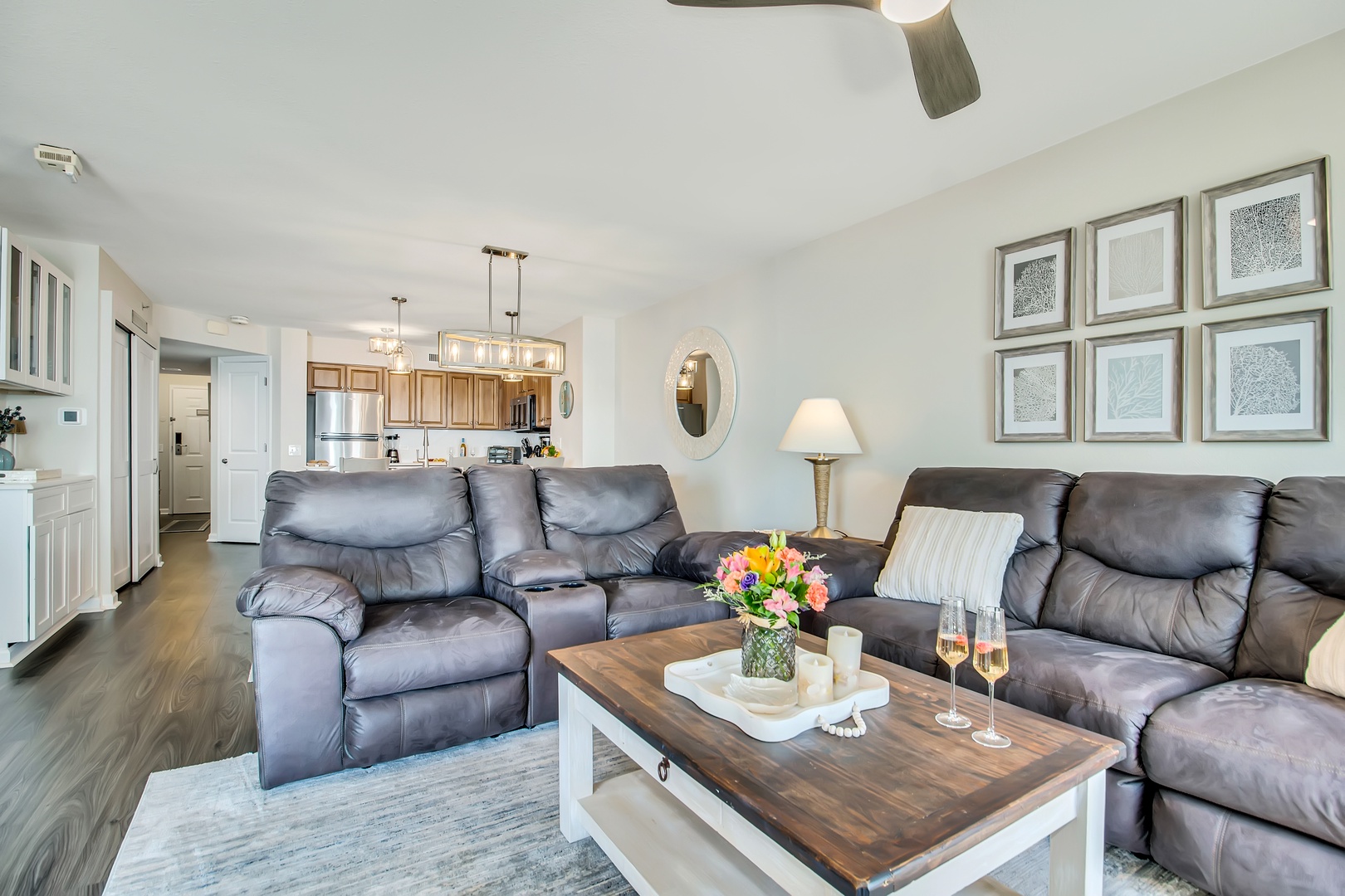 Sink into plush leather sofas in your spacious living room, perfectly designed for movie nights with sparkling wine.