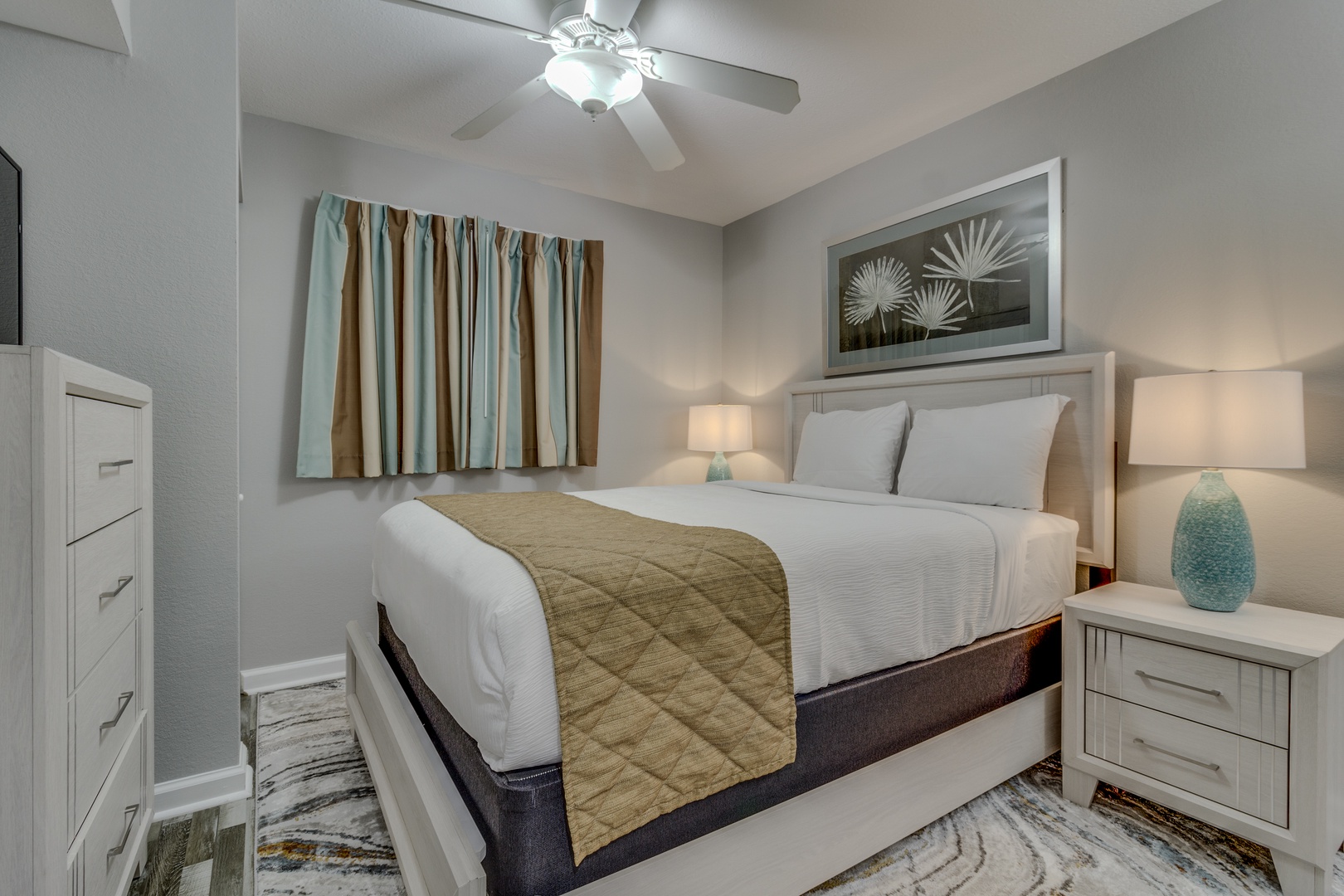 Your serene bedroom features crisp linens, soft lighting, and thoughtful coastal touches that create the perfect retreat for peaceful nights.