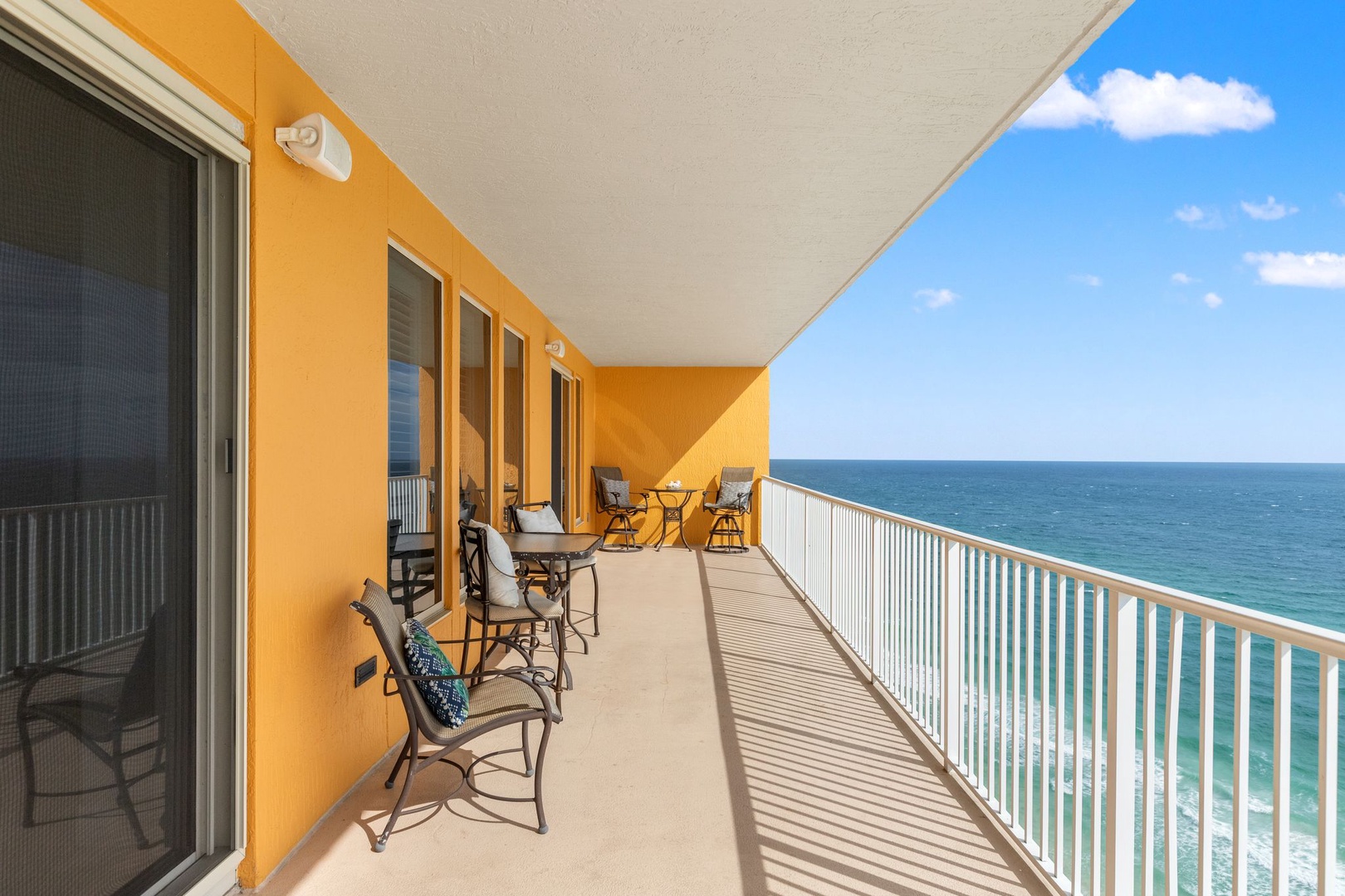 Step onto your private balcony and soak in endless ocean views. Relax in comfy seating with the sea breeze and sunshine as your companions.