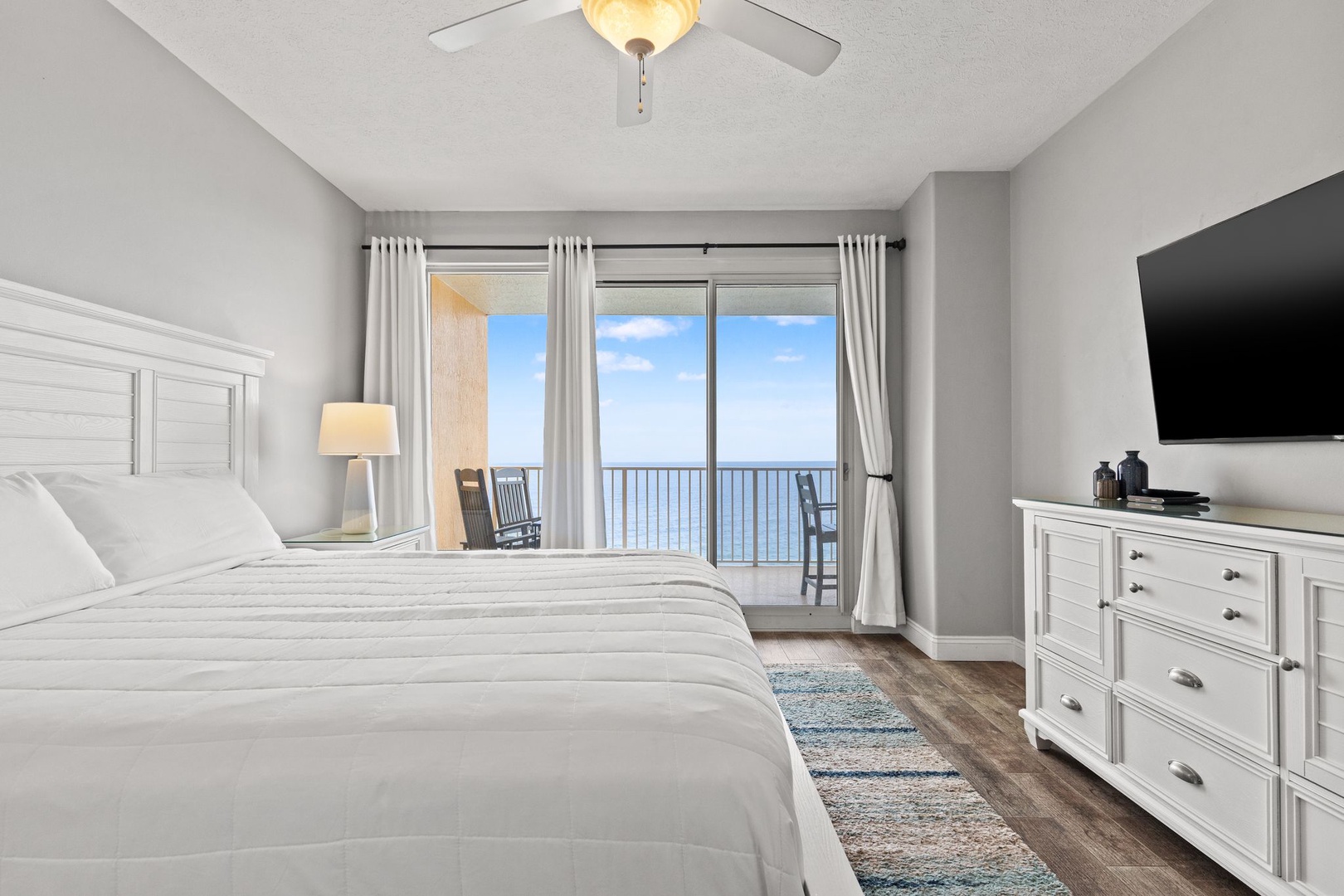 Wake up to breathtaking ocean views from your plush bed, where soft linens and coastal breezes create the perfect retreat for your seaside escape.