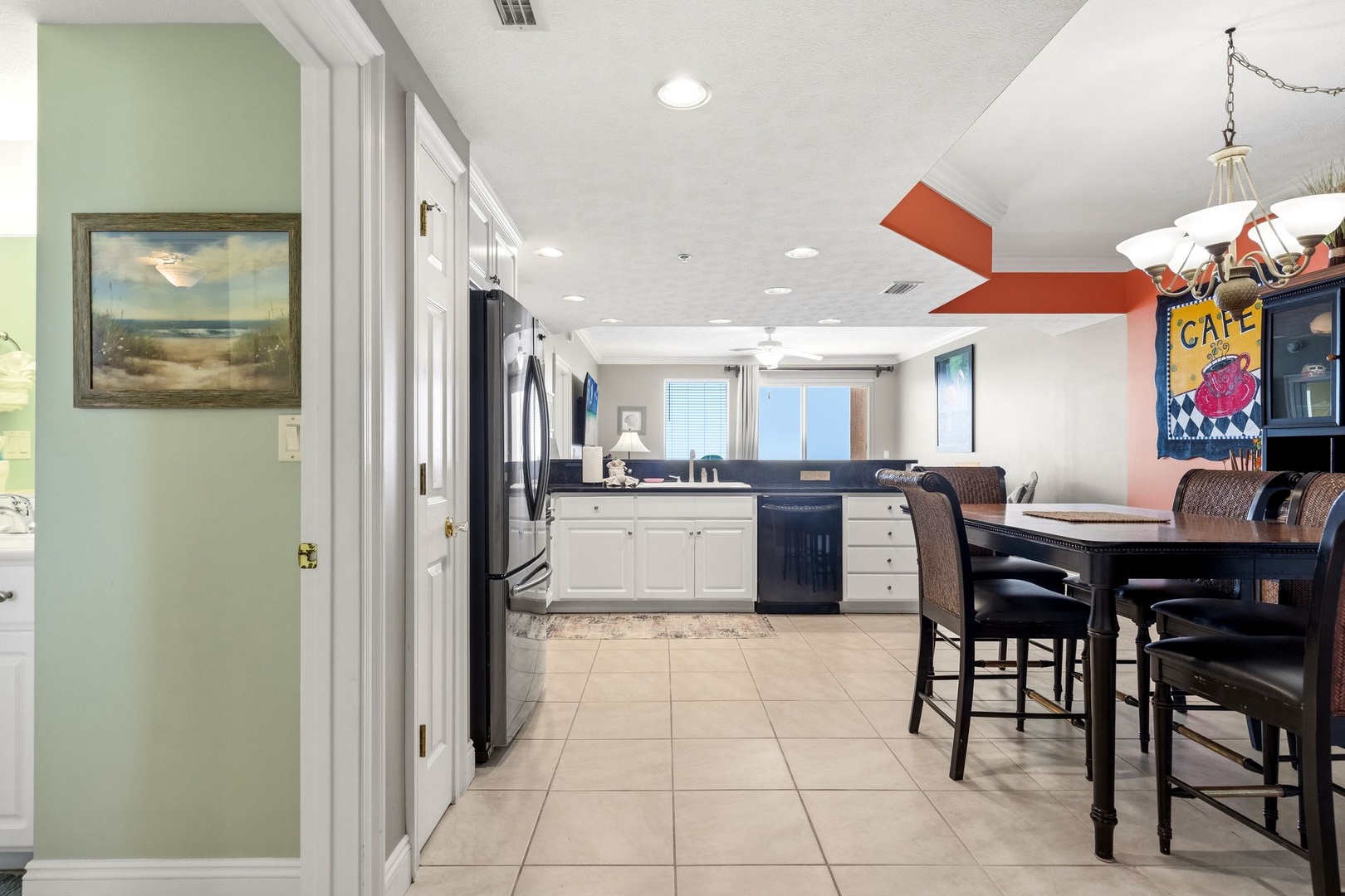Your spacious kitchen and dining area invites memorable meals with modern appliances, ample counter space, and seating for the whole group.