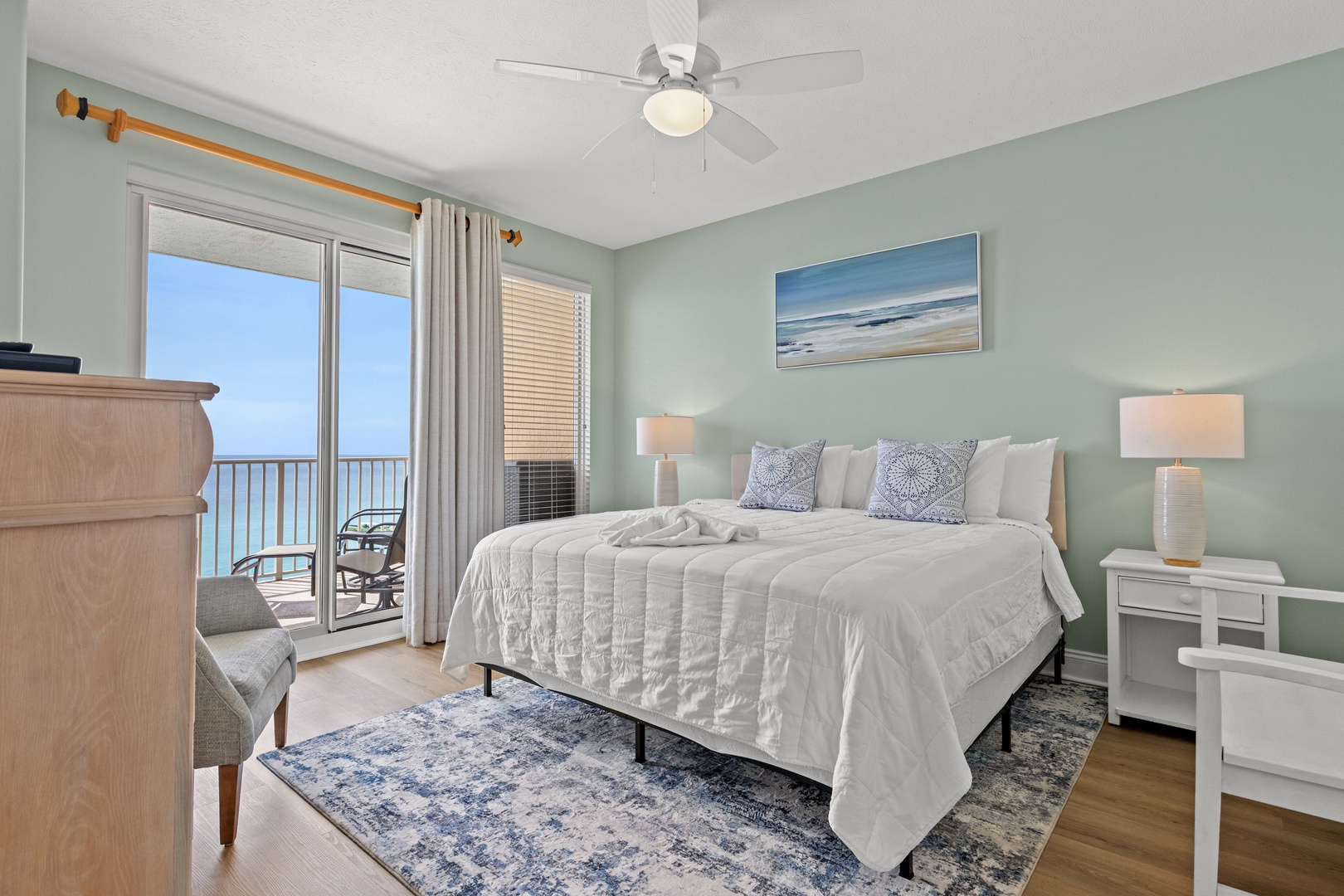 Wake up to stunning ocean views from your comfortable bed, with the sea breeze flowing through your private balcony doors.