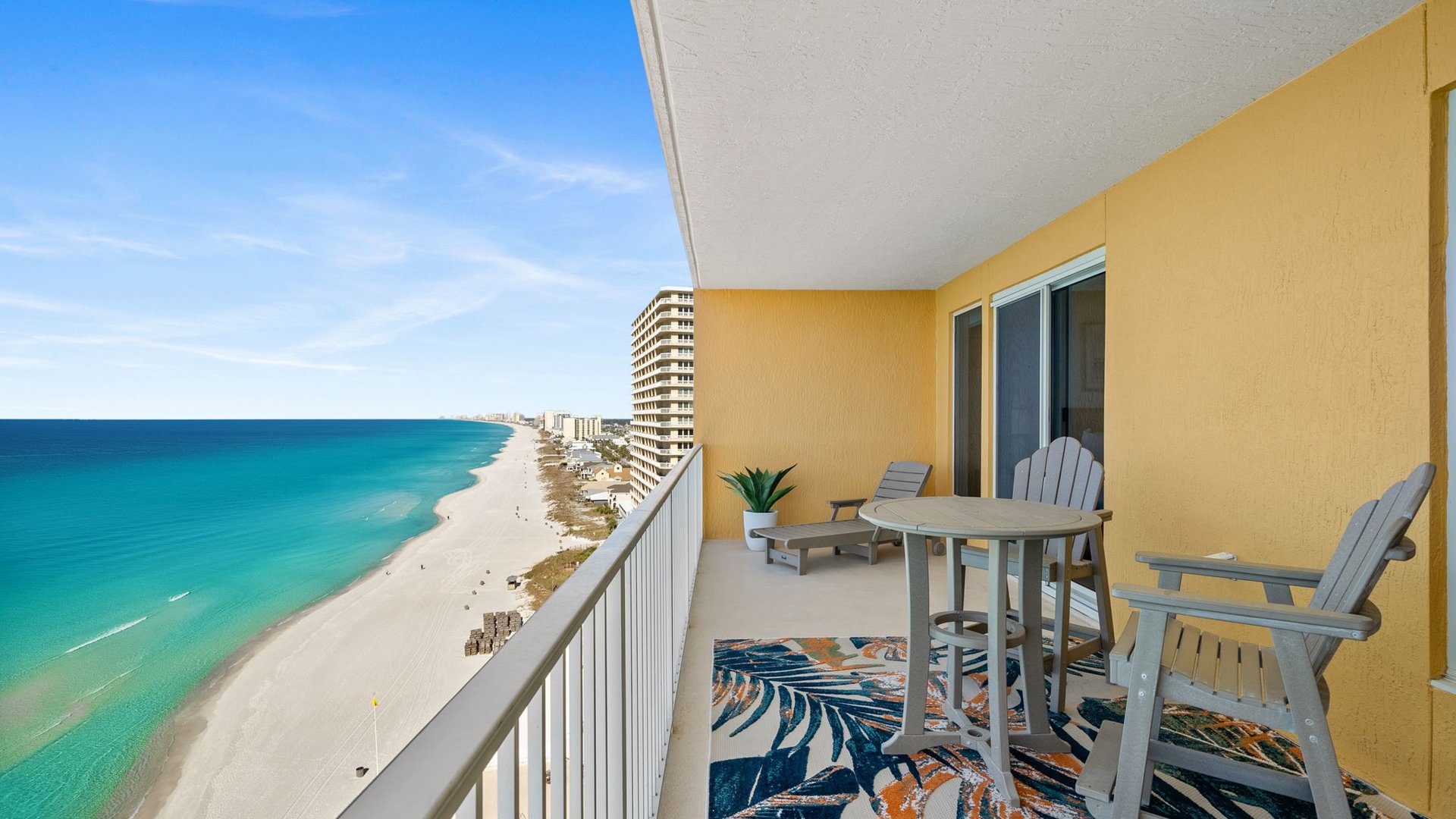 Sip your morning coffee on your private balcony with stunning ocean views and comfortable seating overlooking pristine beaches.