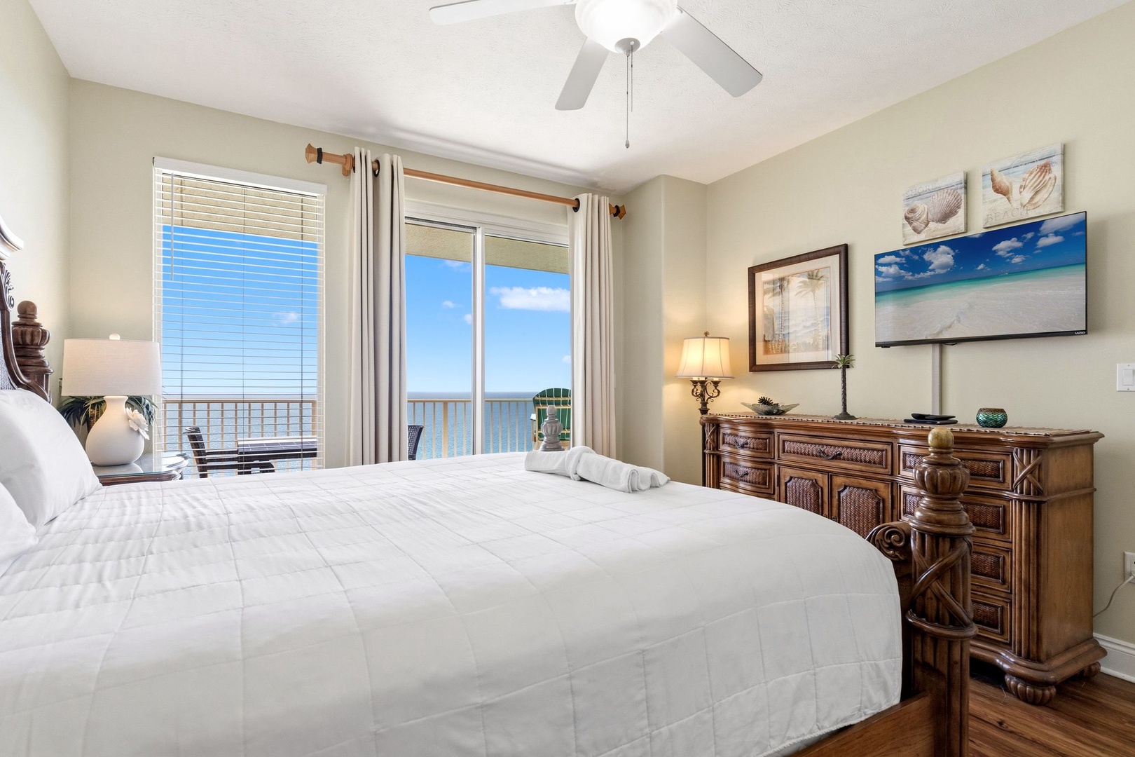 Wake up to breathtaking ocean views from your comfortable bedroom, where soft linens and coastal artwork create the perfect retreat.