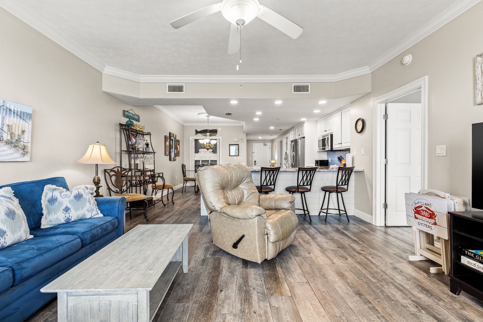 Relax in your spacious open-concept living area with high ceilings, stylish furnishings, and a fully equipped kitchen—perfect for unwinding after a day of adventure.