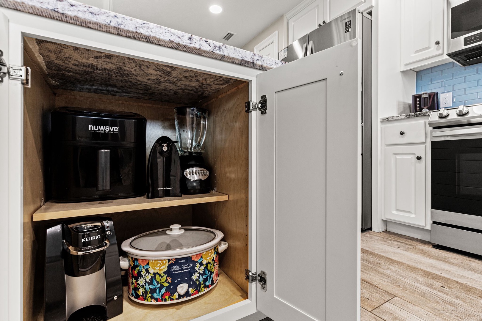 Discover your fully equipped kitchen with a Keurig and drip coffee maker ready for your morning brew, plus a blender and slow cooker for easy meal prep during your stay.