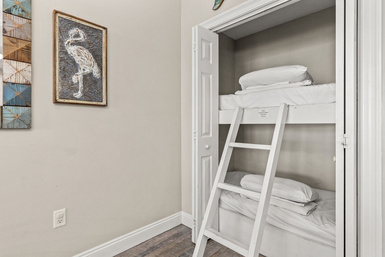 Your little ones will love climbing into these cozy bunk beds, perfectly tucked into their own sleeping nook for sweet dreams and seaside adventures.
