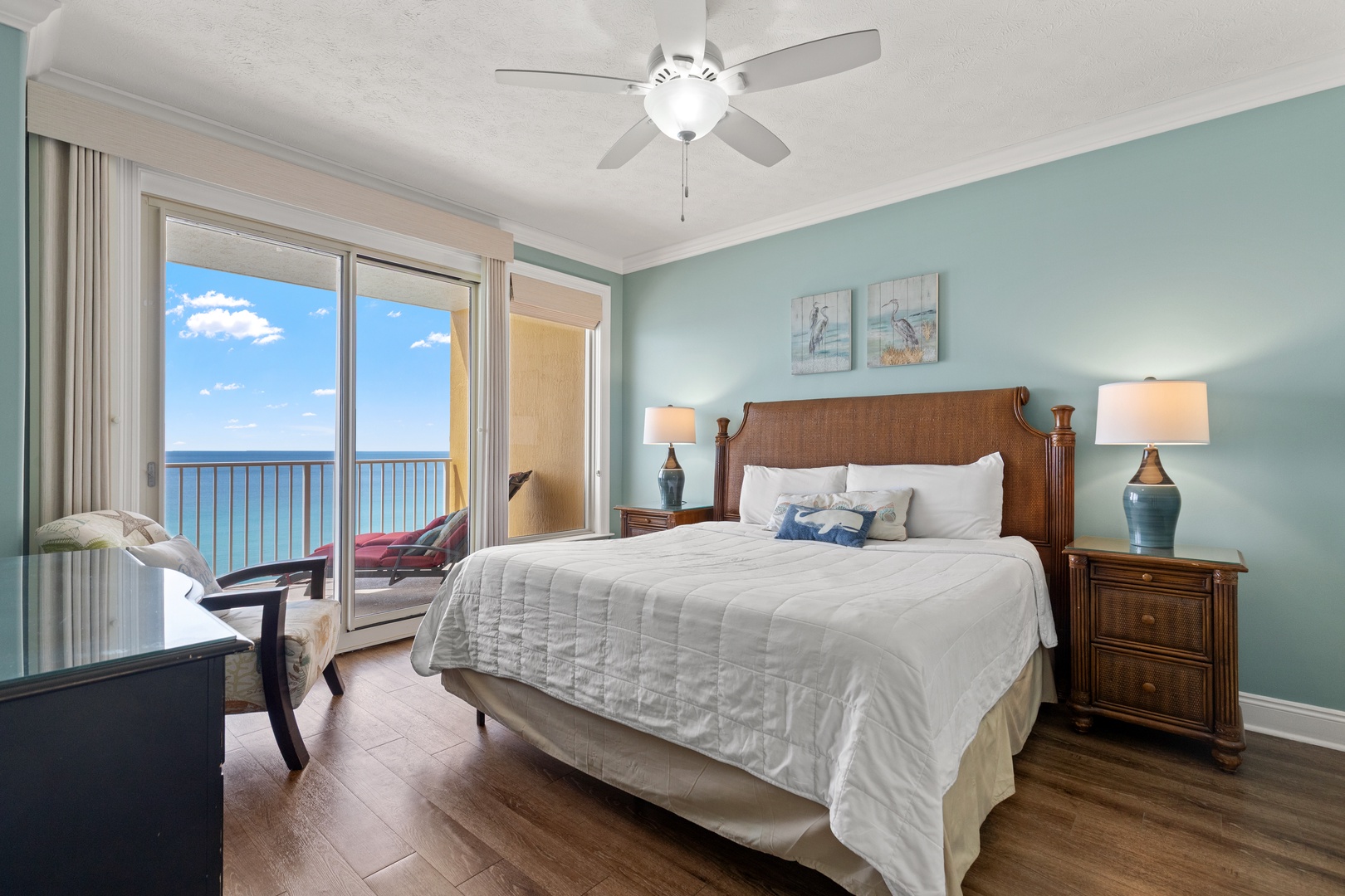 Wake up to breathtaking ocean views from your coastal bedroom, where calming sea tones and crisp linens create your perfect beachside retreat.