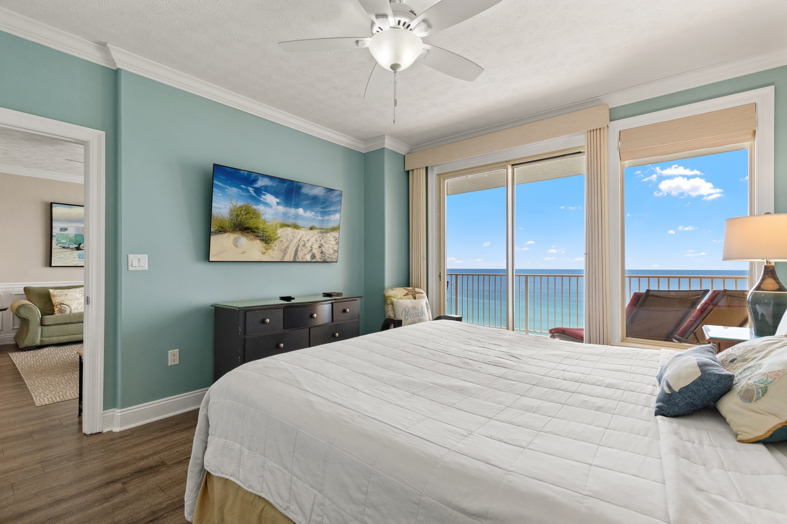 Wake up to stunning ocean views from your comfortable bed, with calming coastal decor creating the perfect seaside retreat atmosphere.