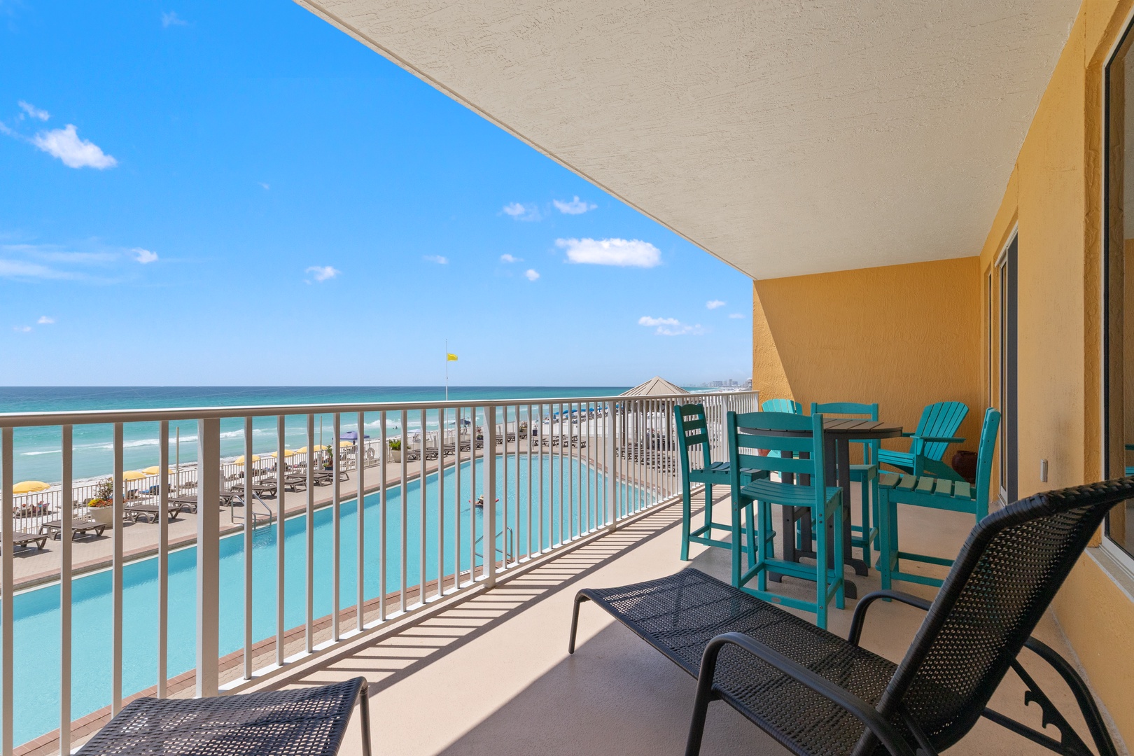 Your private balcony offers breathtaking ocean views where you can sip morning coffee or unwind with evening cocktails overlooking the pristine beach.