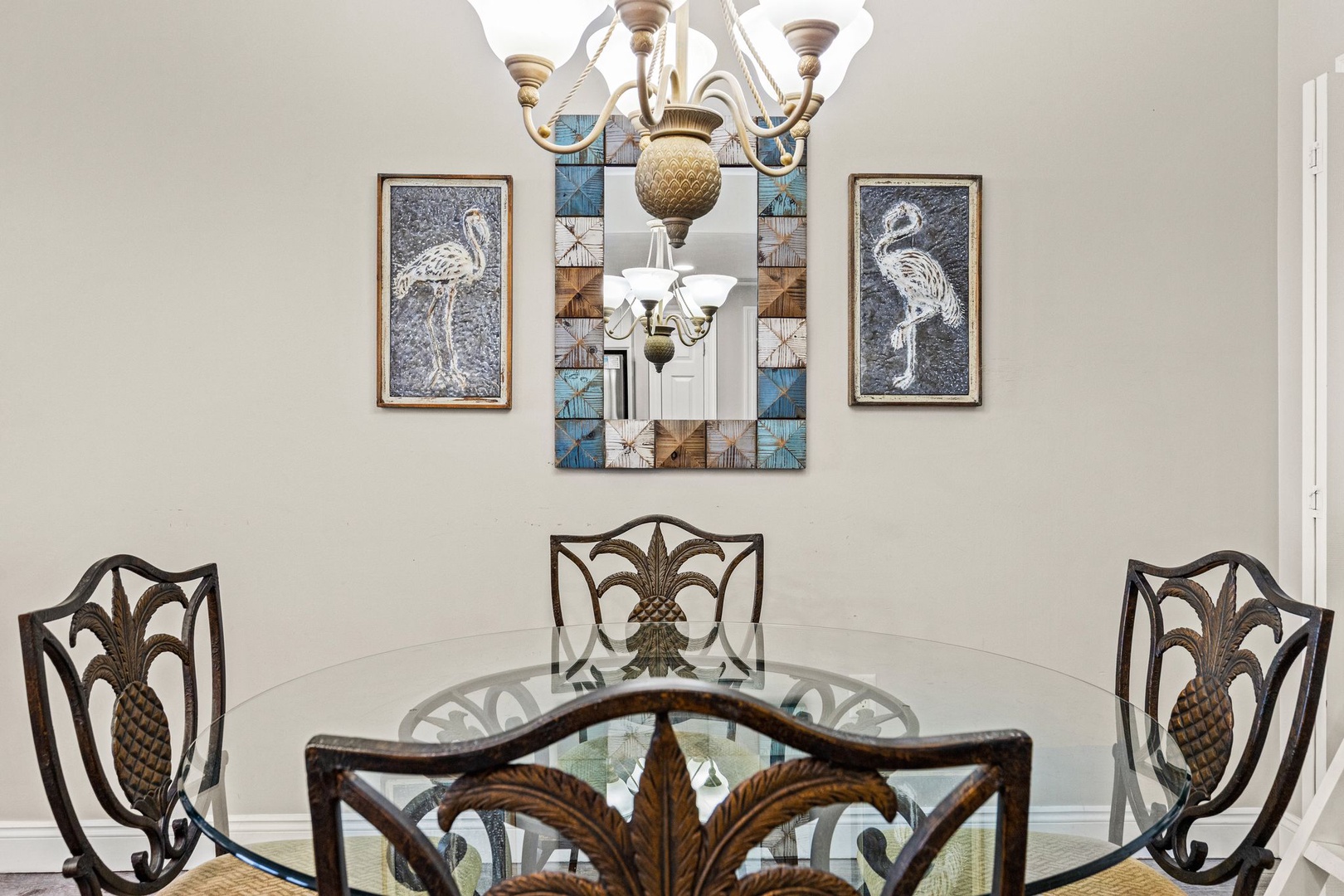 Your elegant dining table awaits, where tropical-inspired décor and soft lighting create the perfect atmosphere for leisurely breakfasts and memorable meals.
