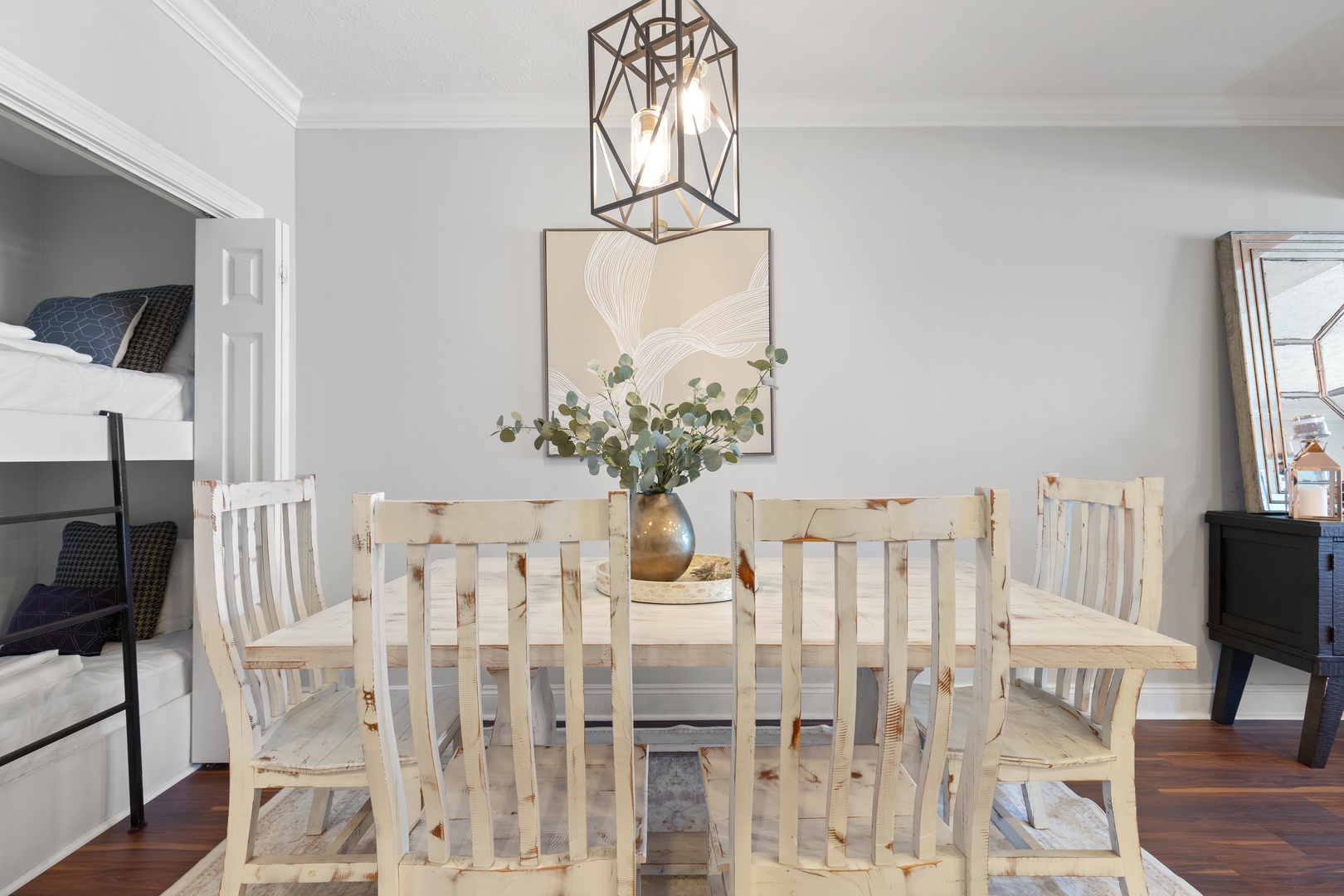 Gather around your spacious dining table where rustic charm meets modern comfort, perfect for memorable meals together.
