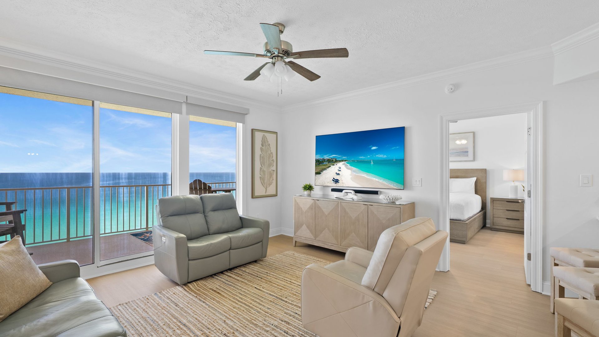 Unwind in your oceanfront living room with stunning sea views and comfortable furnishings for the perfect beach getaway.