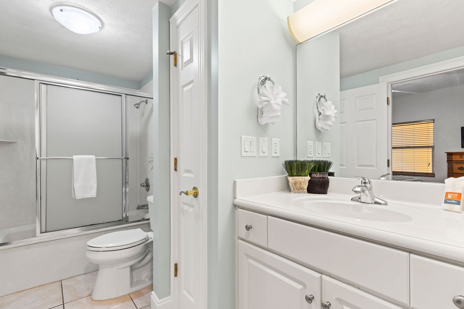 Refresh in your private bathroom with a spacious walk-in shower, soft towels, and plenty of counter space to spread out your things and feel right at home.