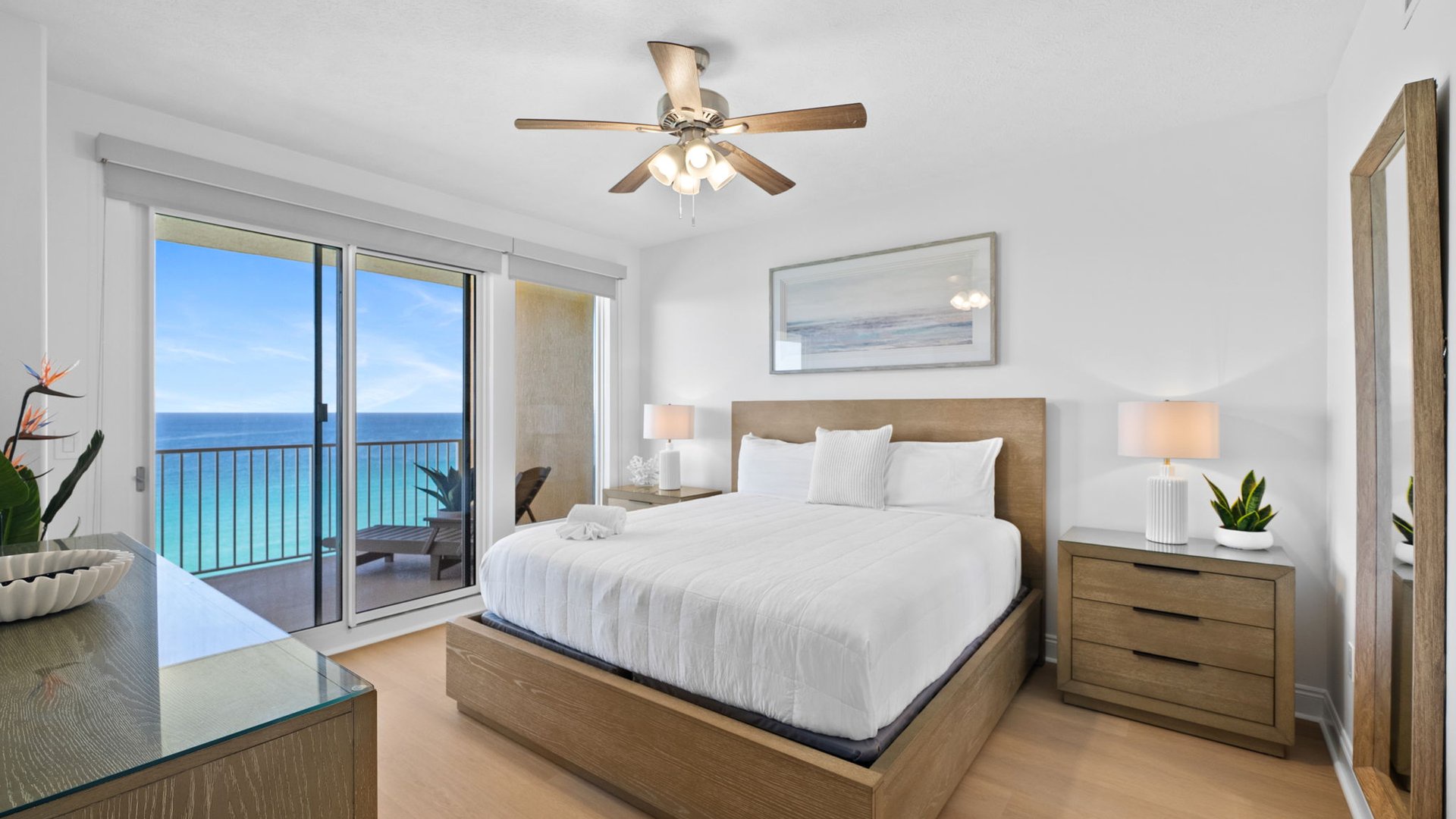 Wake to stunning ocean views from your comfortable king bed, with French doors opening to your private balcony overlooking endless blue waters.