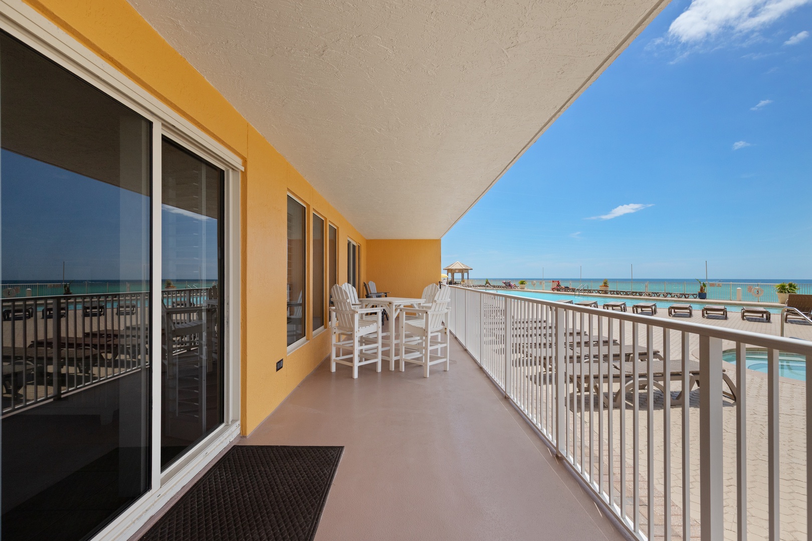 Step onto your private balcony and soak in stunning ocean views while enjoying morning coffee at your outdoor dining table.