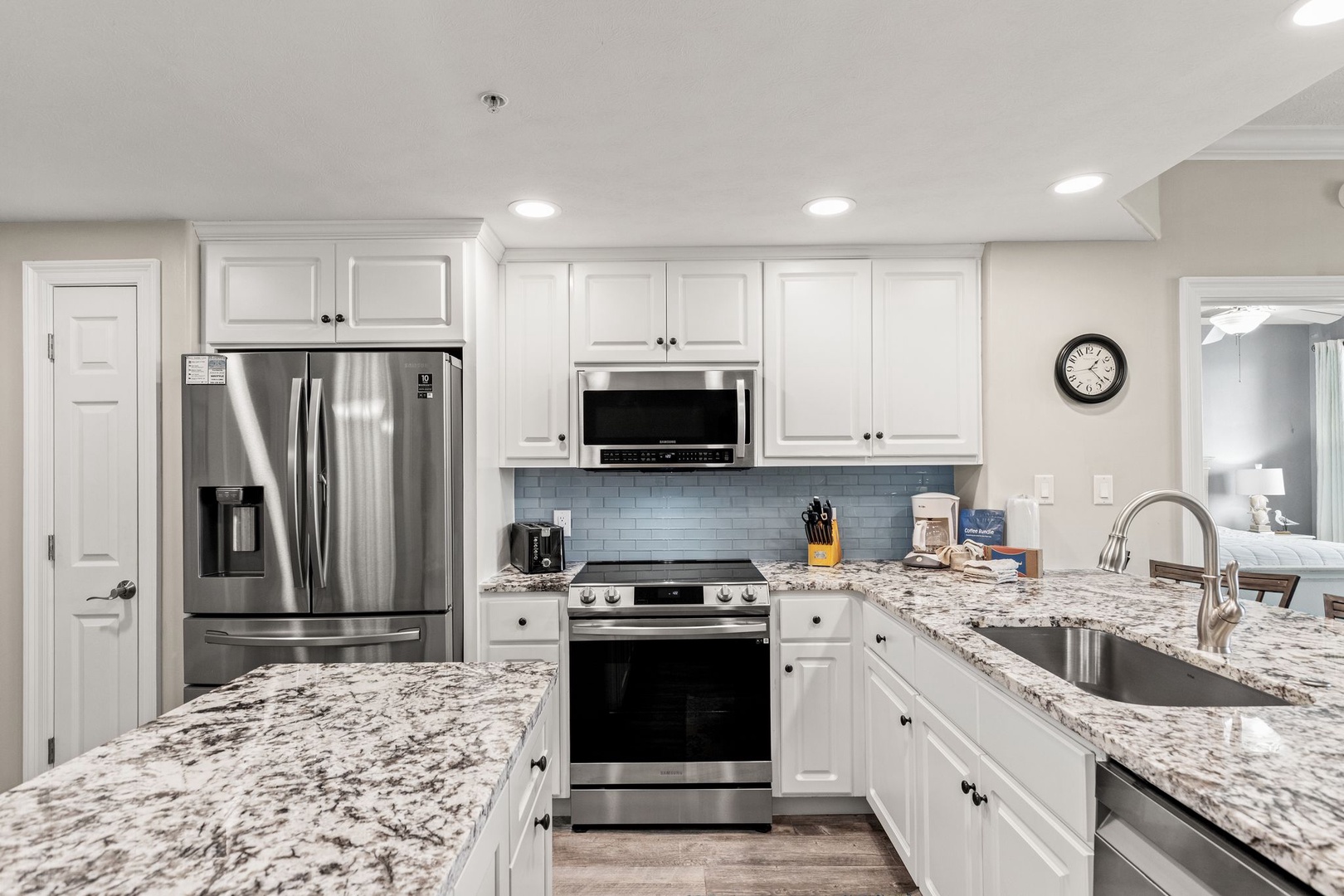 A fully-equipped kitchen awaits your culinary adventures with sleek stainless appliances, granite countertops, and all the modern conveniences to make meal prep effortless and enjoyable.