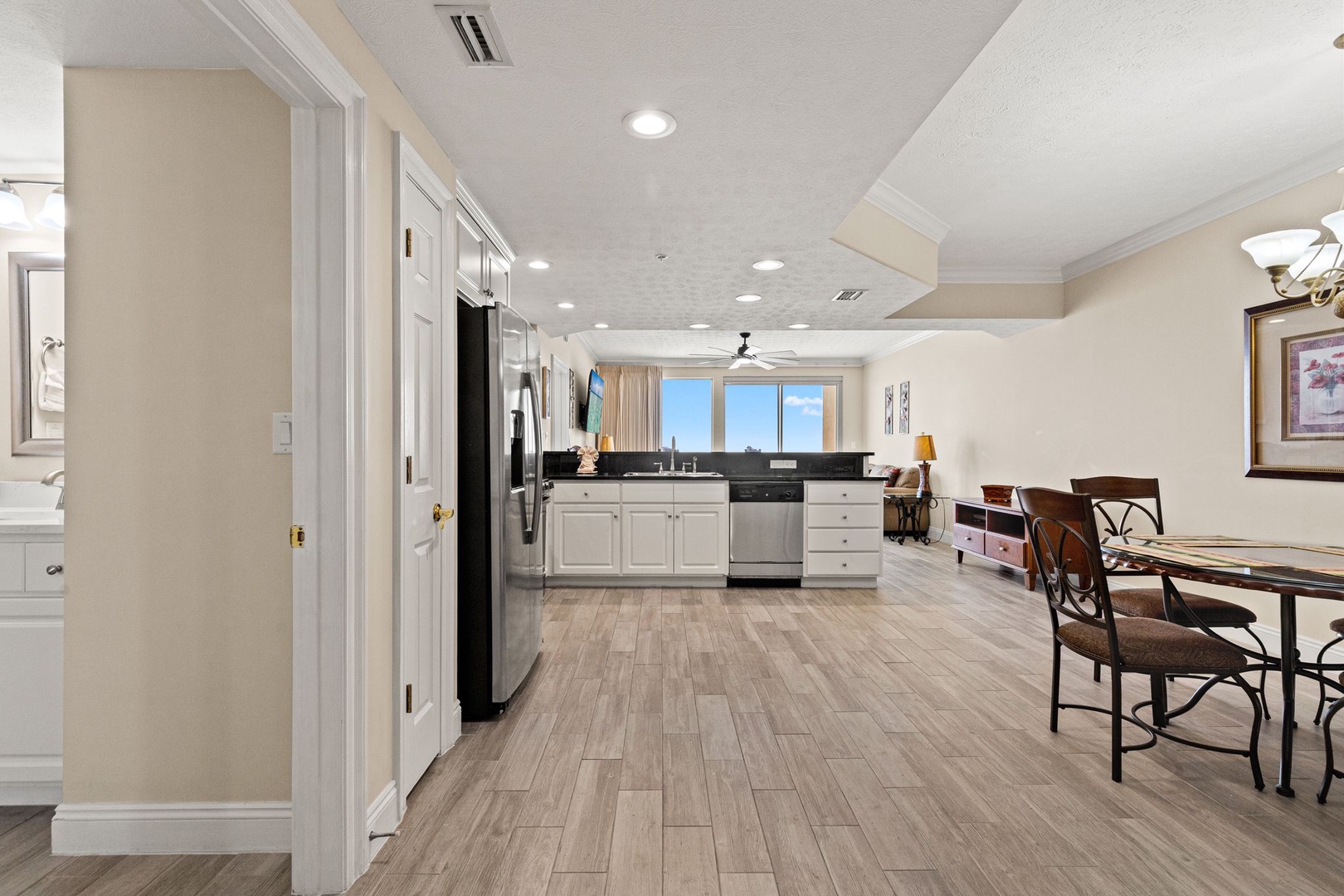 You'll love cooking and dining in this bright, open space featuring modern appliances and elegant furnishings with beautiful views.