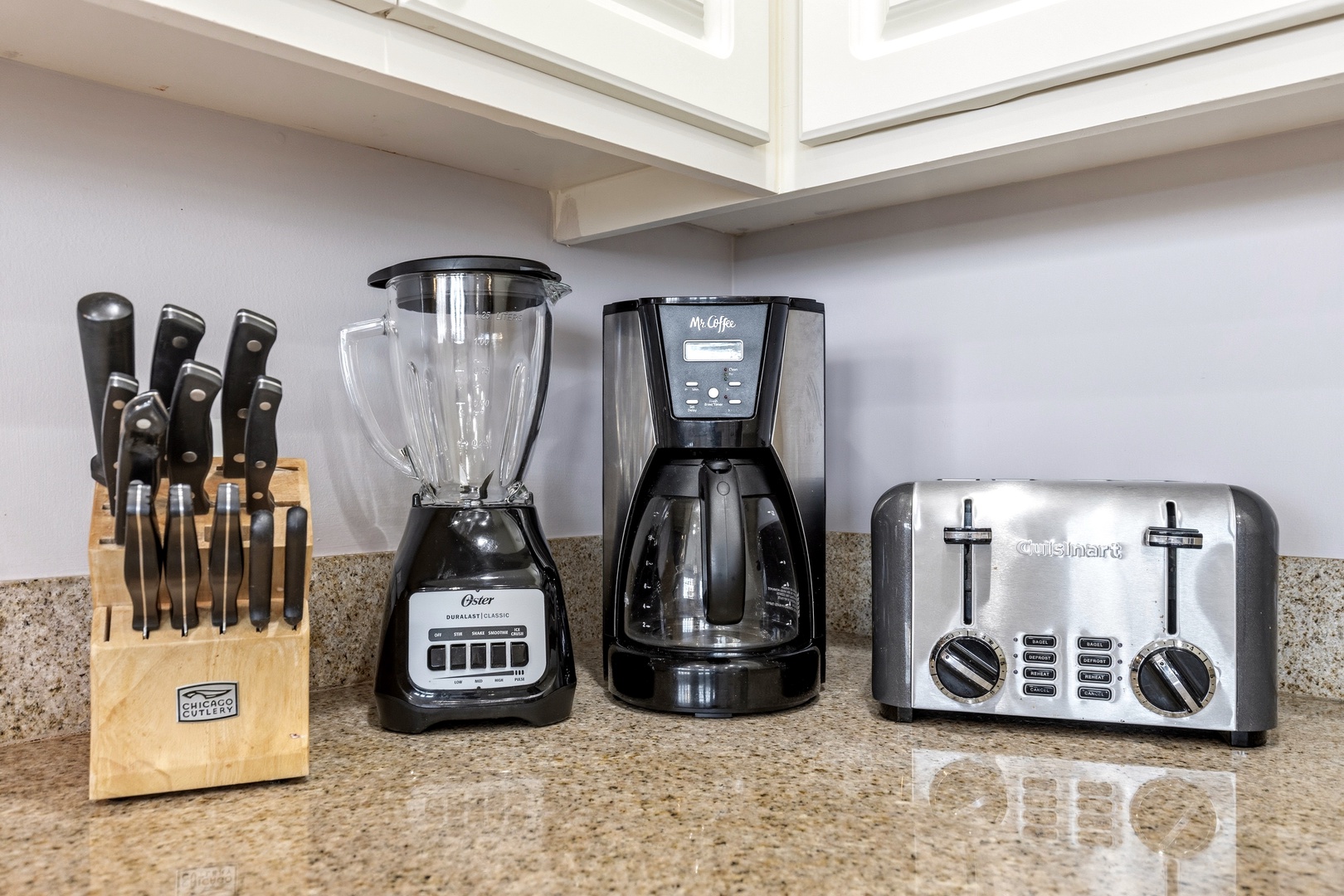 Your fully equipped kitchen features quality appliances including a blender, coffee maker, and toaster for convenient meal preparation during your stay.