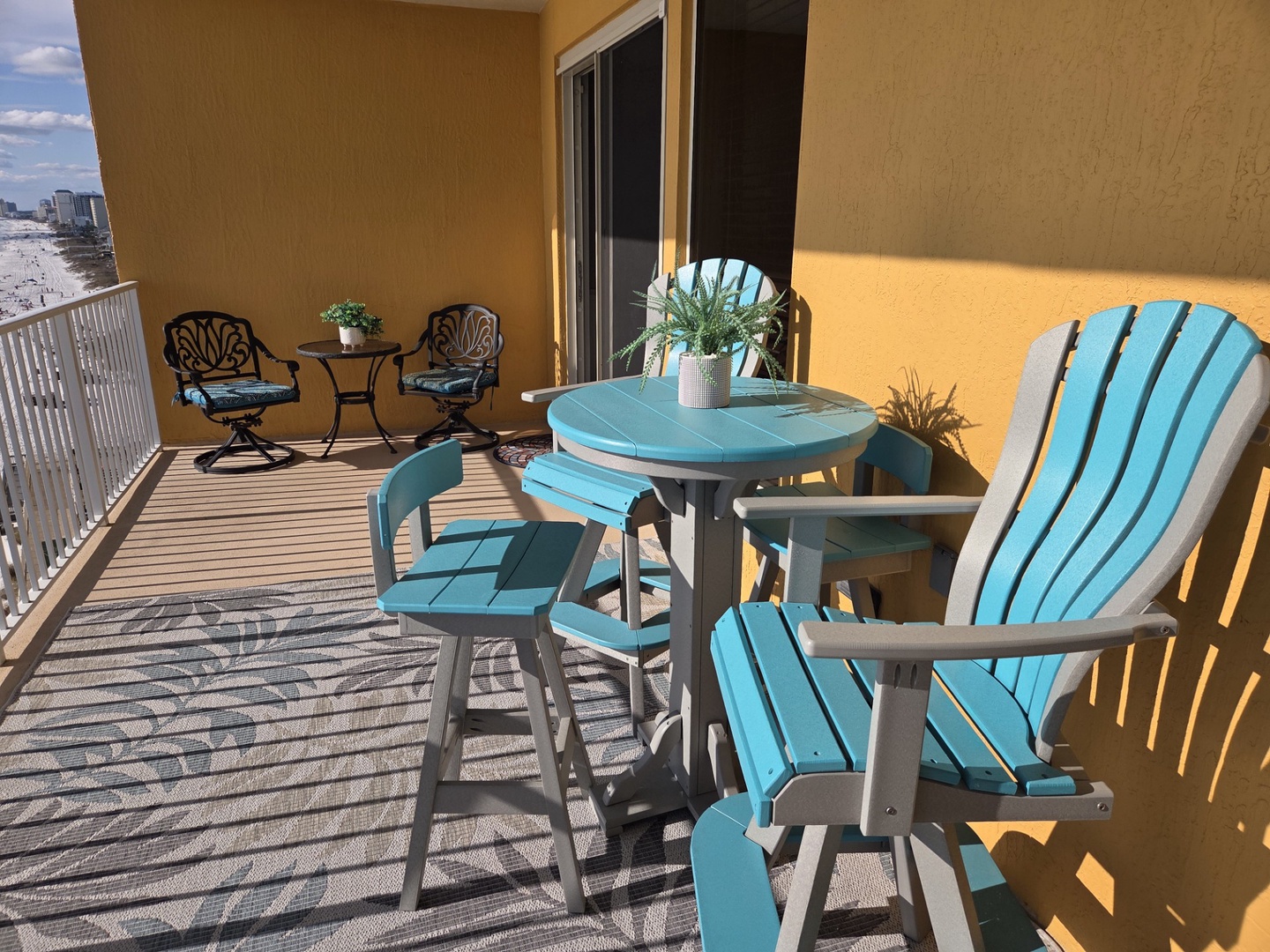 Sip your morning coffee on your private balcony while watching the sunrise paint golden light across comfortable seating.
