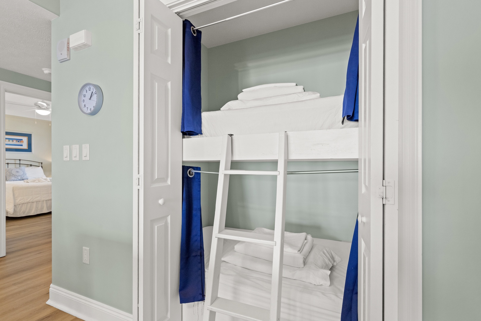 Your kids will love claiming their own cozy sleeping spot in these thoughtfully designed bunk beds with privacy curtains.