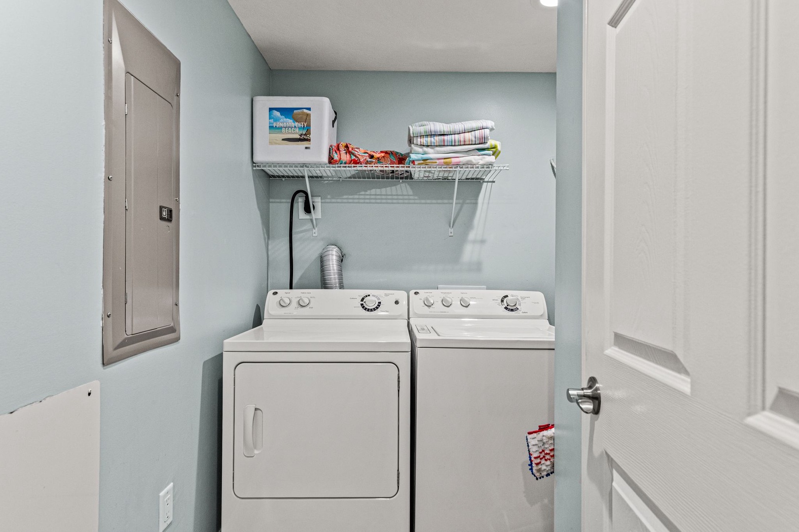 Your in-unit washer and dryer means you can pack light and keep fresh linens throughout your stay, with plenty of storage above for beach gear and extra towels.