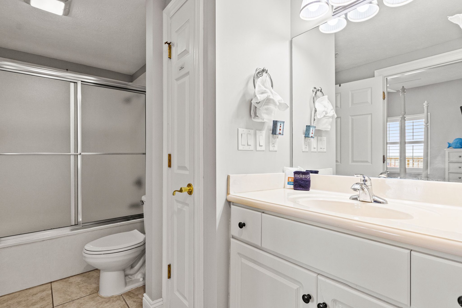 Freshen up in your bright, spotless bathroom with a spacious vanity, large mirror, and a relaxing shower to start or end your day just right.