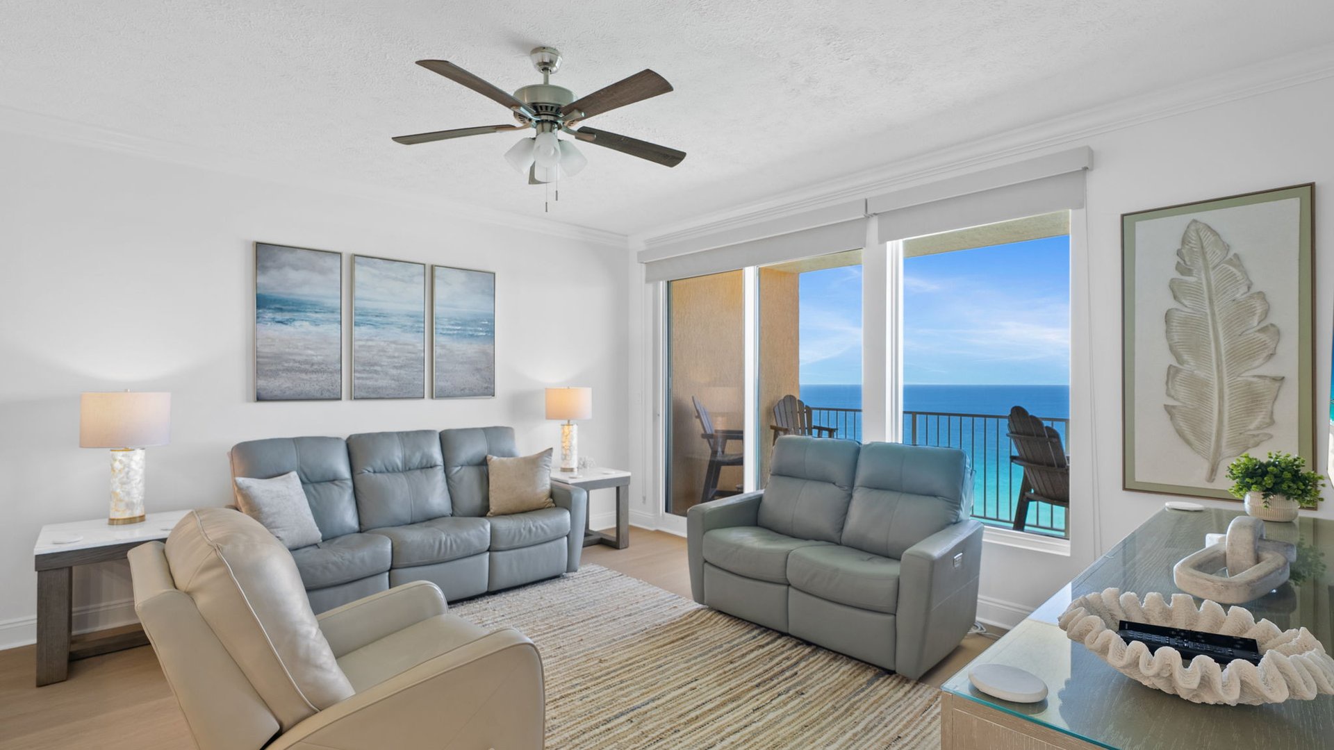 Relax in your bright living room with stunning ocean views and comfortable seating for the whole family to enjoy.