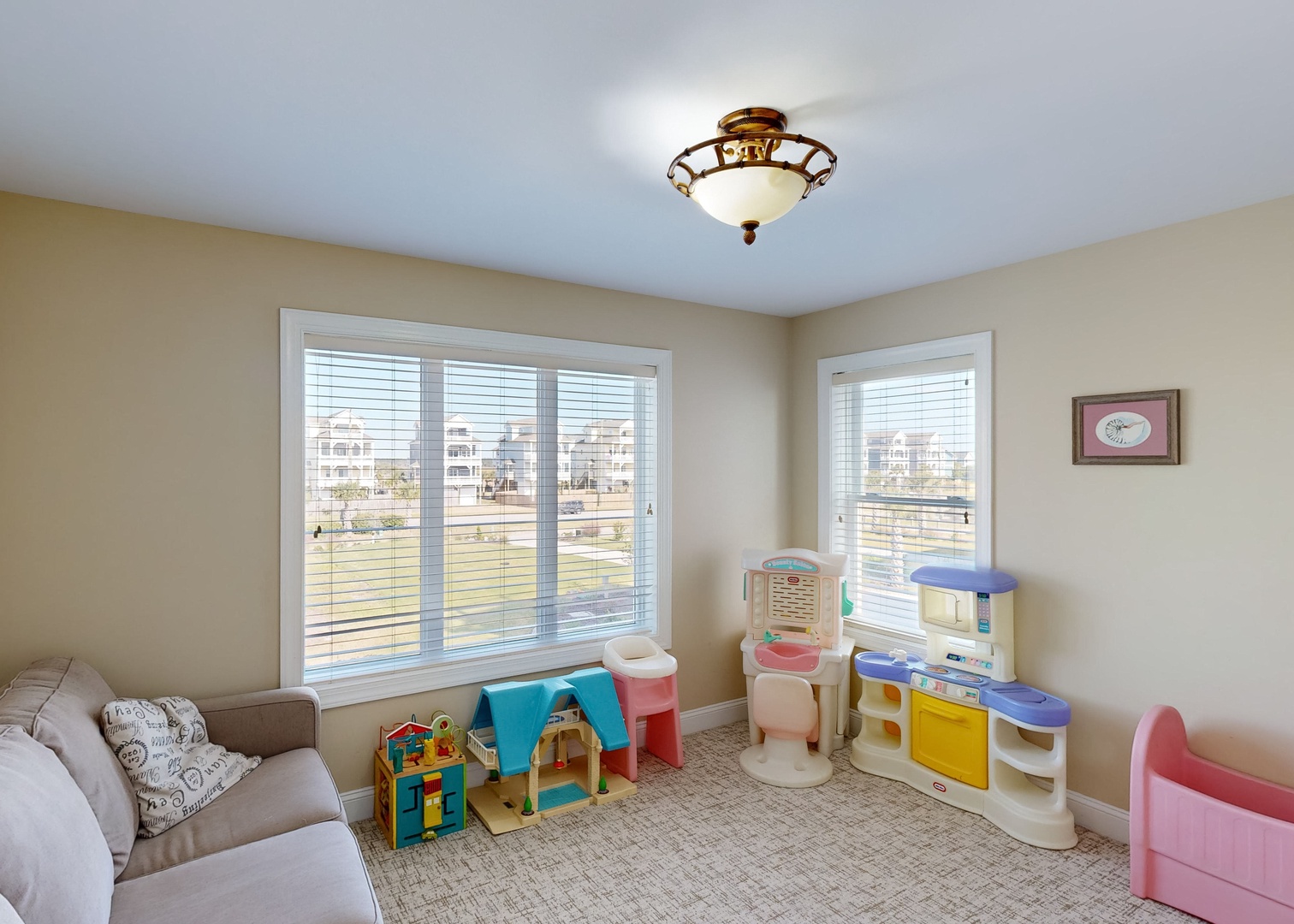 Your little ones will love this bright playroom, complete with toys and a cozy sofa where you can relax and watch them play.