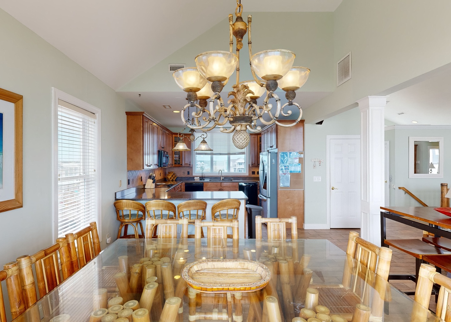 Gather around the elegant dining table for memorable meals, with the fully-equipped kitchen ready to help you create delicious dishes during your stay.