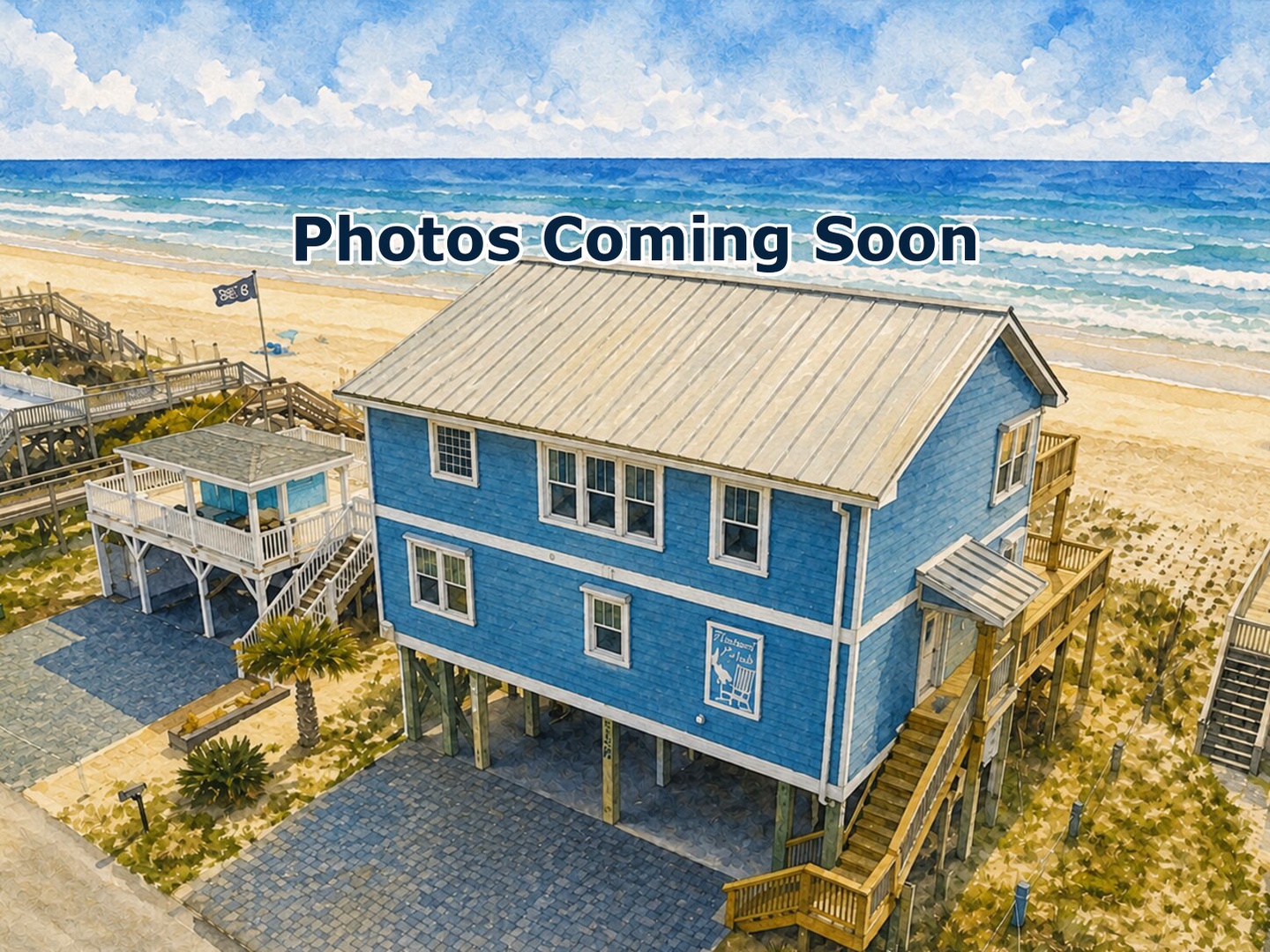 Aerial view of a charming beachfront property with direct access to sandy shores and ocean waves, surrounded by coastal dunes and neighboring homes.