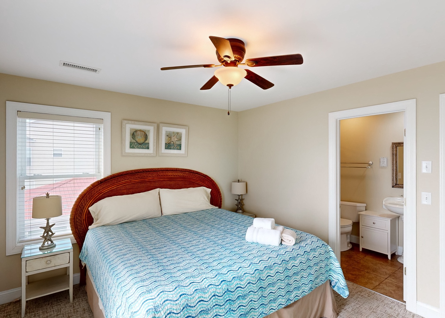 Sink into the plush bed after a sun-filled day and let the ceiling fan keep your space cool and comfortable. Your private en-suite makes mornings easy and convenient.