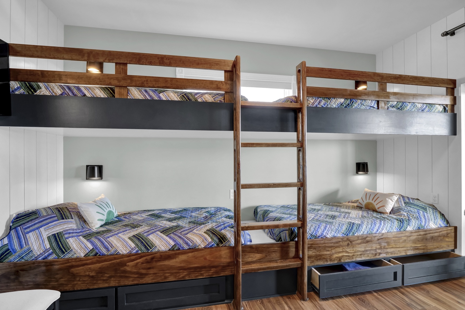 Your crew will love these custom bunk beds with built-in storage and individual reading lights, making bedtime a breeze for families or friend groups.