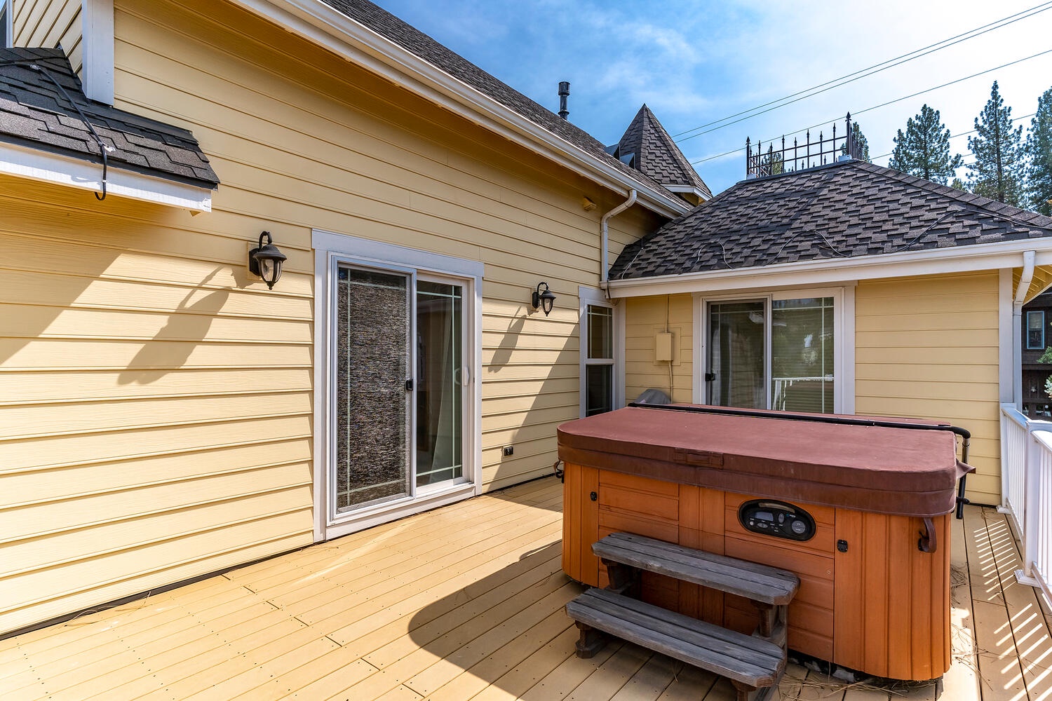 Master Bedroom Patio w/ Hot tub and View of River: Holy Cow Downtown Riverfront