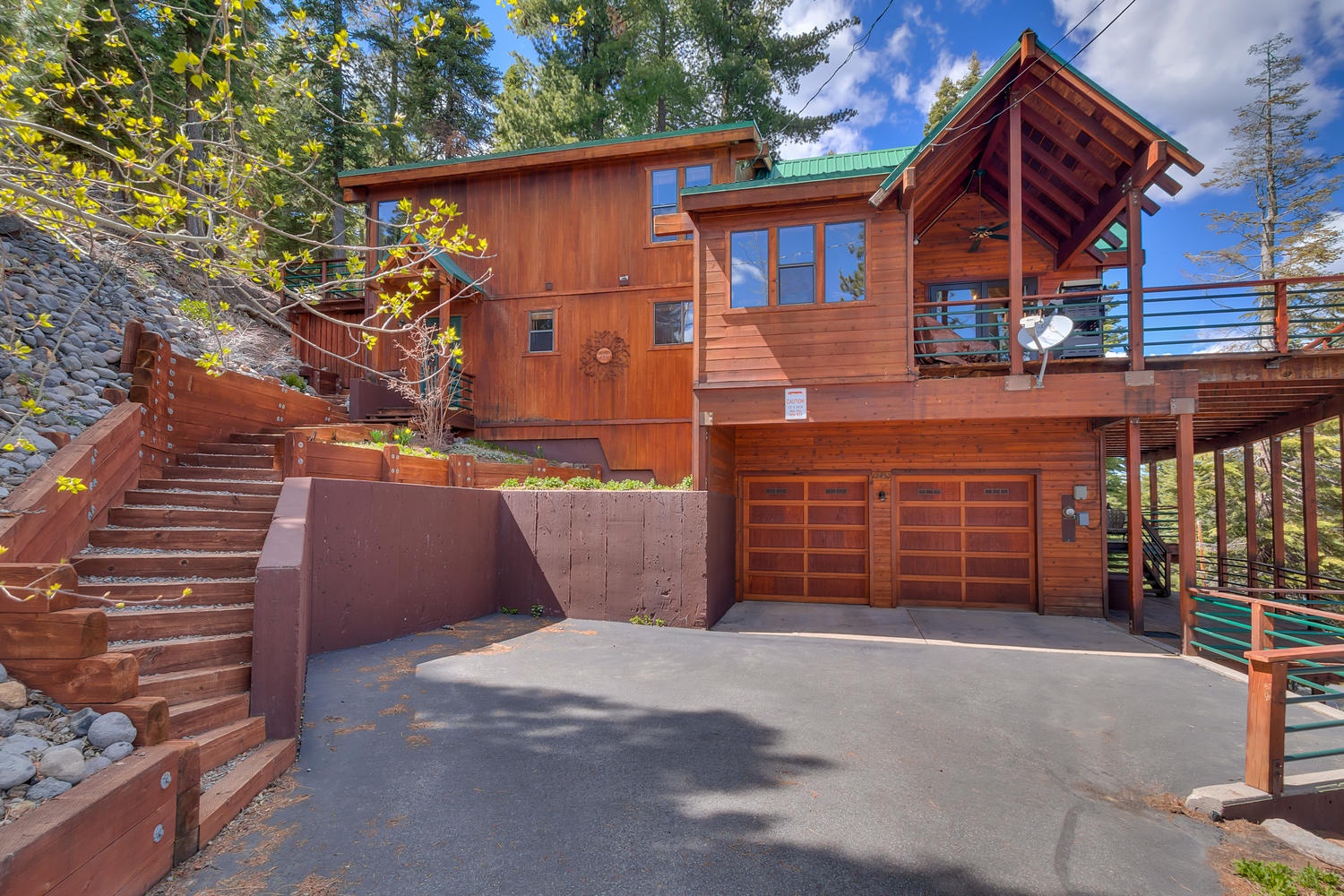 Driveway and main staircase into this cabin in north lake tahoe: Falcon's Eye View Retreat