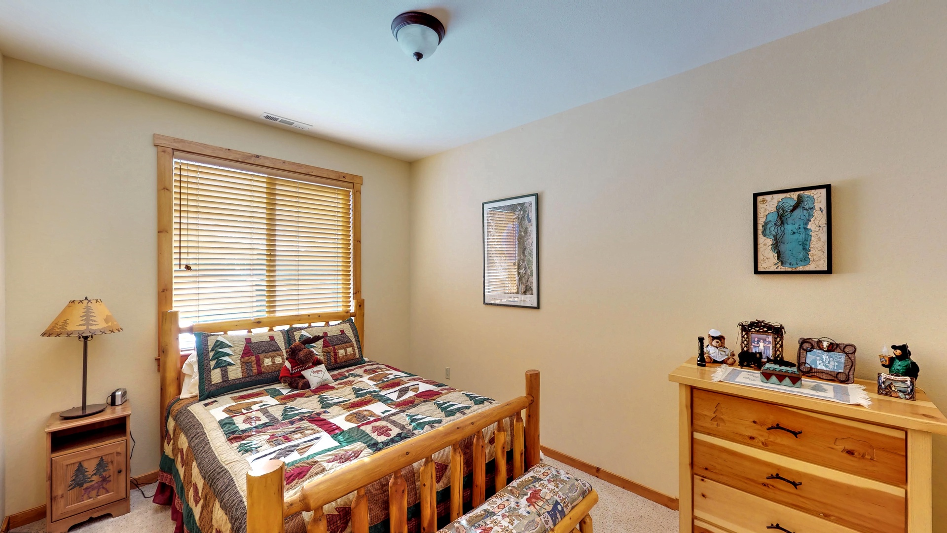 Bedroom with tan walls: Truckee Cinnabar Vacation Retreat