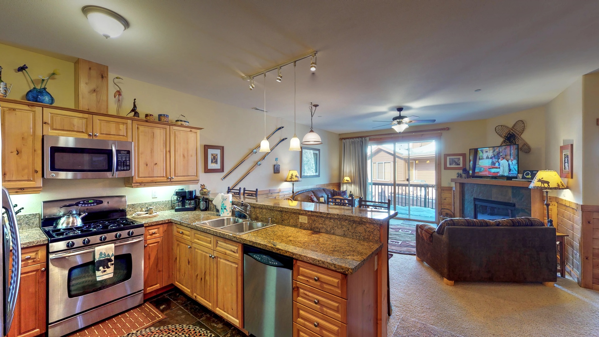 Kitchen with countertops~ oven and microwave: Truckee Cinnabar Vacation Retreat
