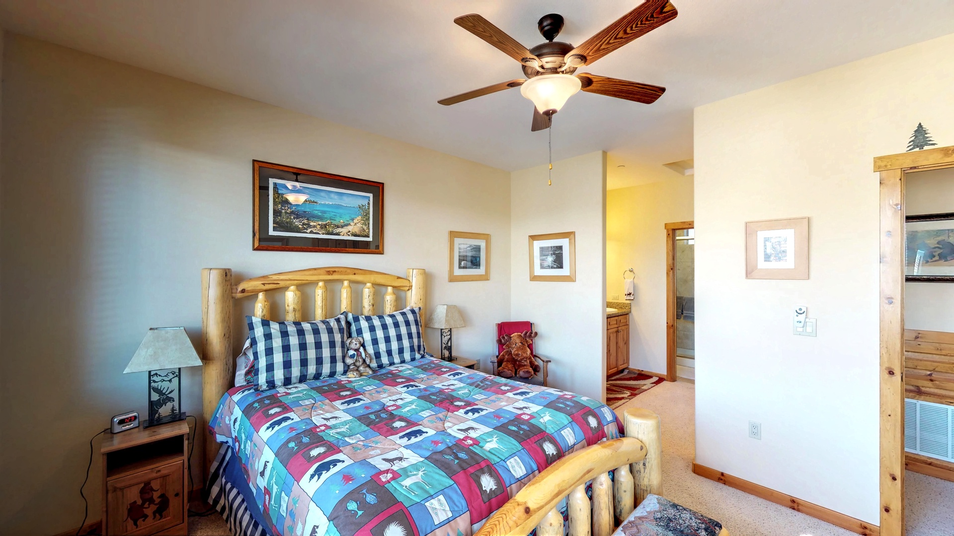 Bedroom with one bed~ nearby bathroom and ceiling fan: Truckee Cinnabar Vacation Retreat