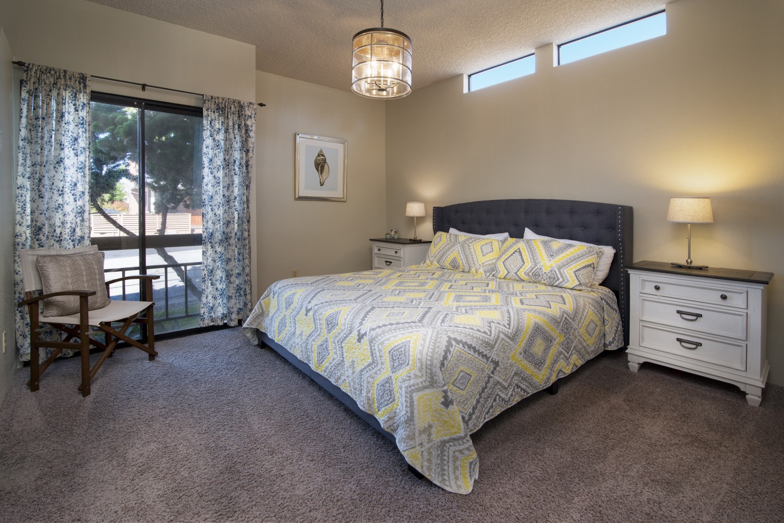 The master suite has a CA king bed