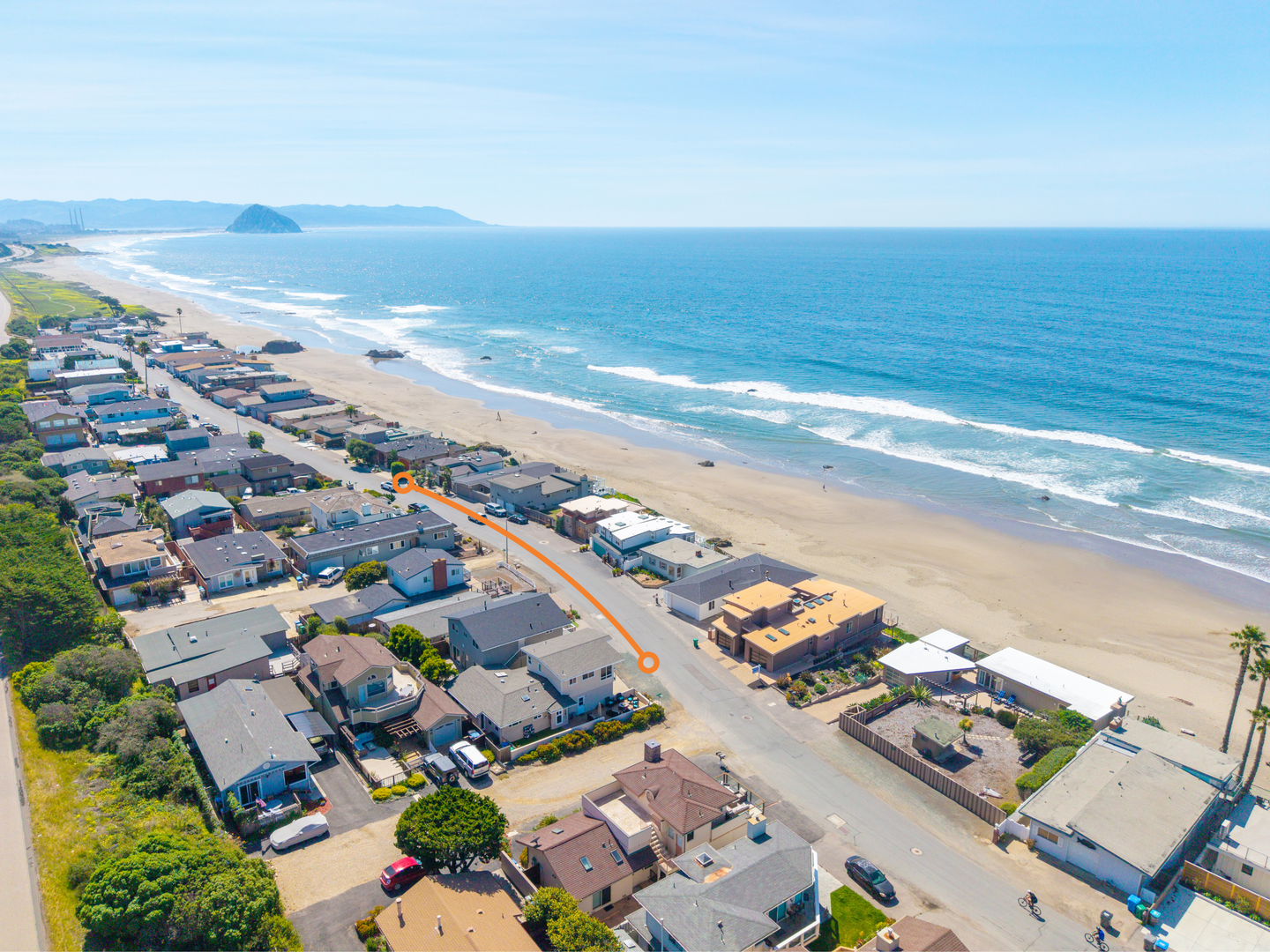 Beach access is a few homes down the street via a path and coastal trail