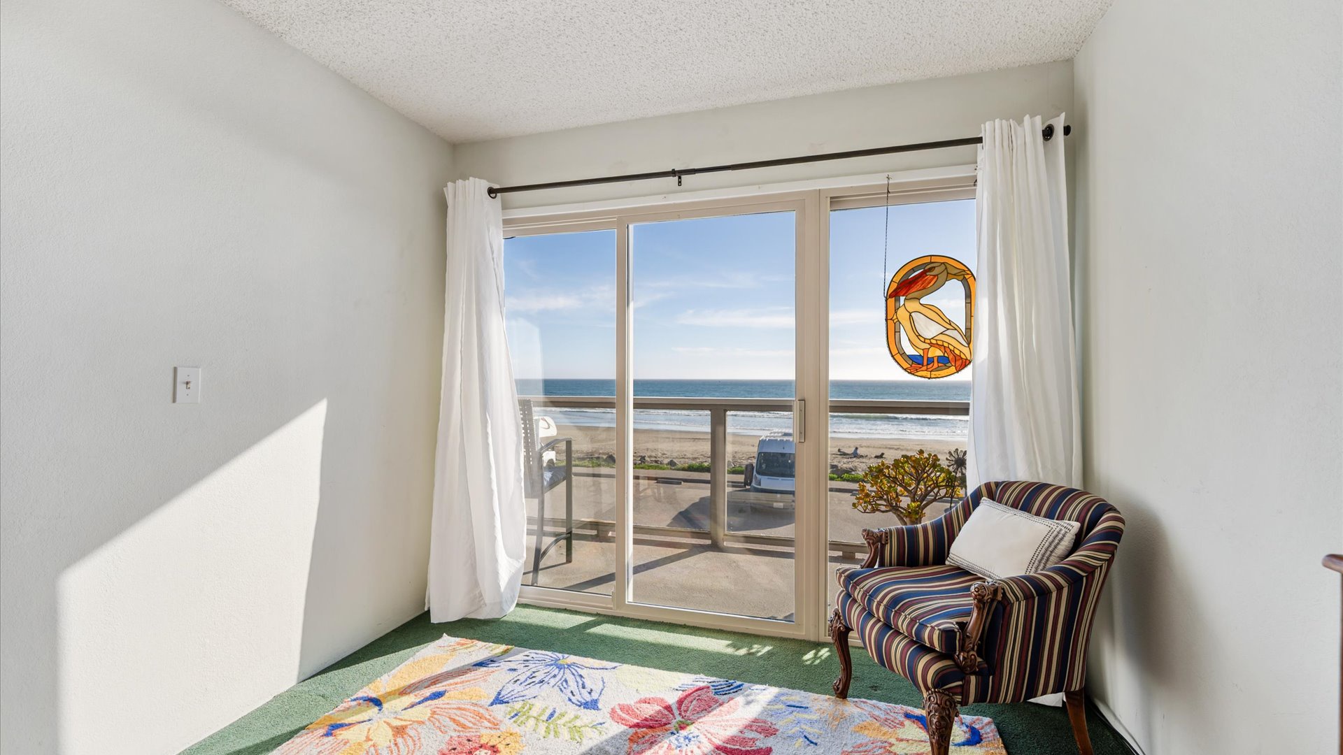 Curl up with a book in your cozy reading nook in the master, where ocean views and gentle breezes create the perfect backdrop for relaxation.