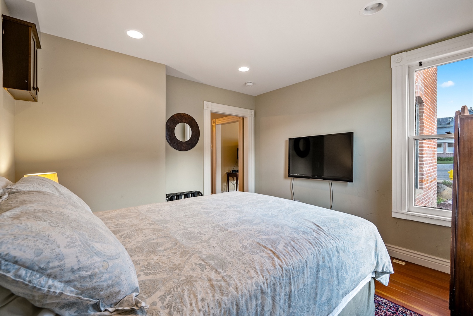 Flat screen tv in the downstairs bedroom