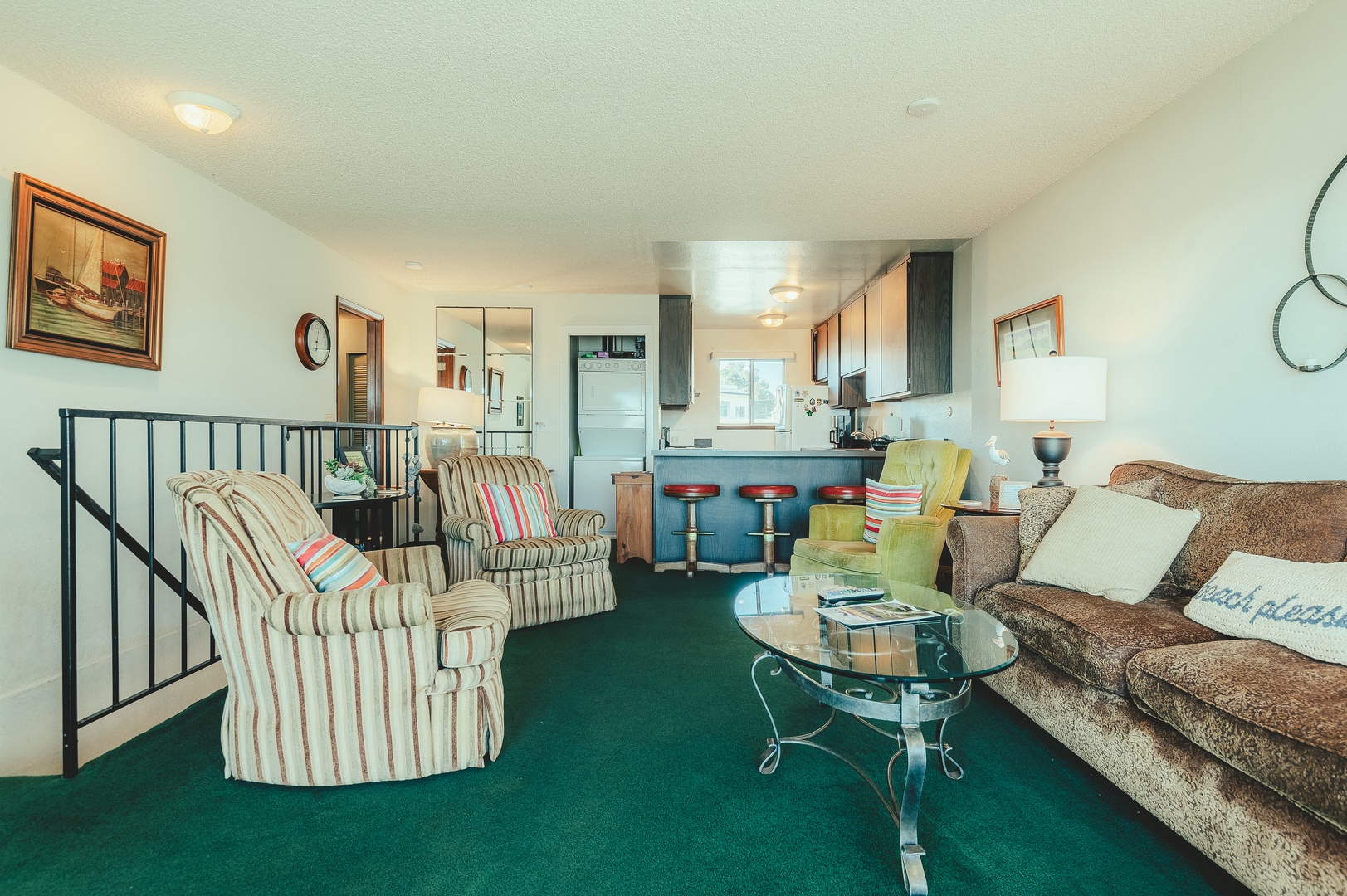 Spacious open-plan living and kitchen area, perfect for unwinding after beach adventures.