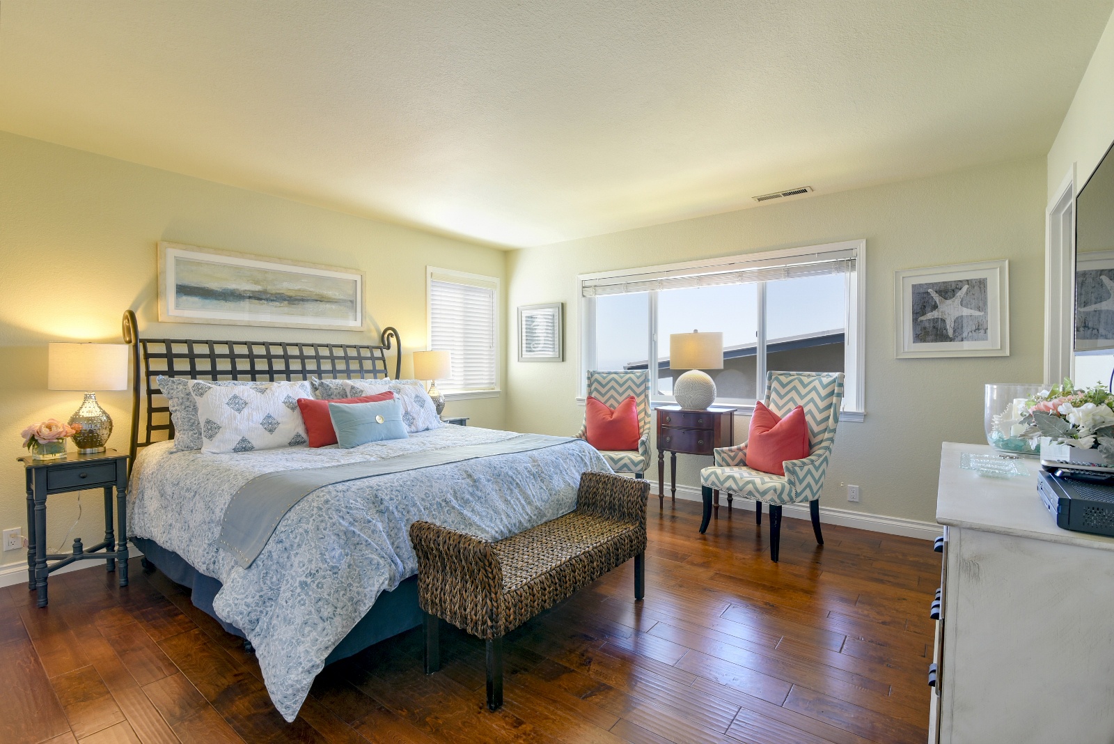 Downstairs Master Bedroom features a king bed, TV, and attached bathroom