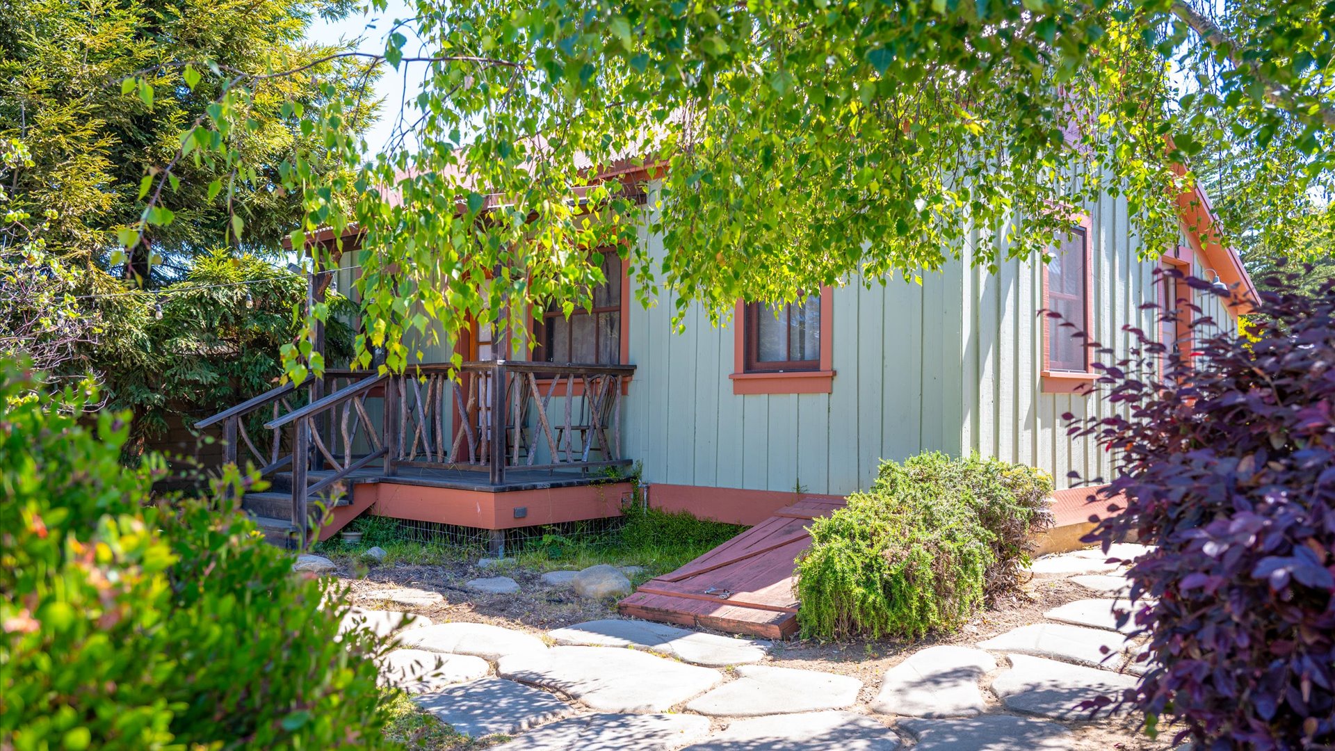Tucked away in the back of the property is the historic cabin