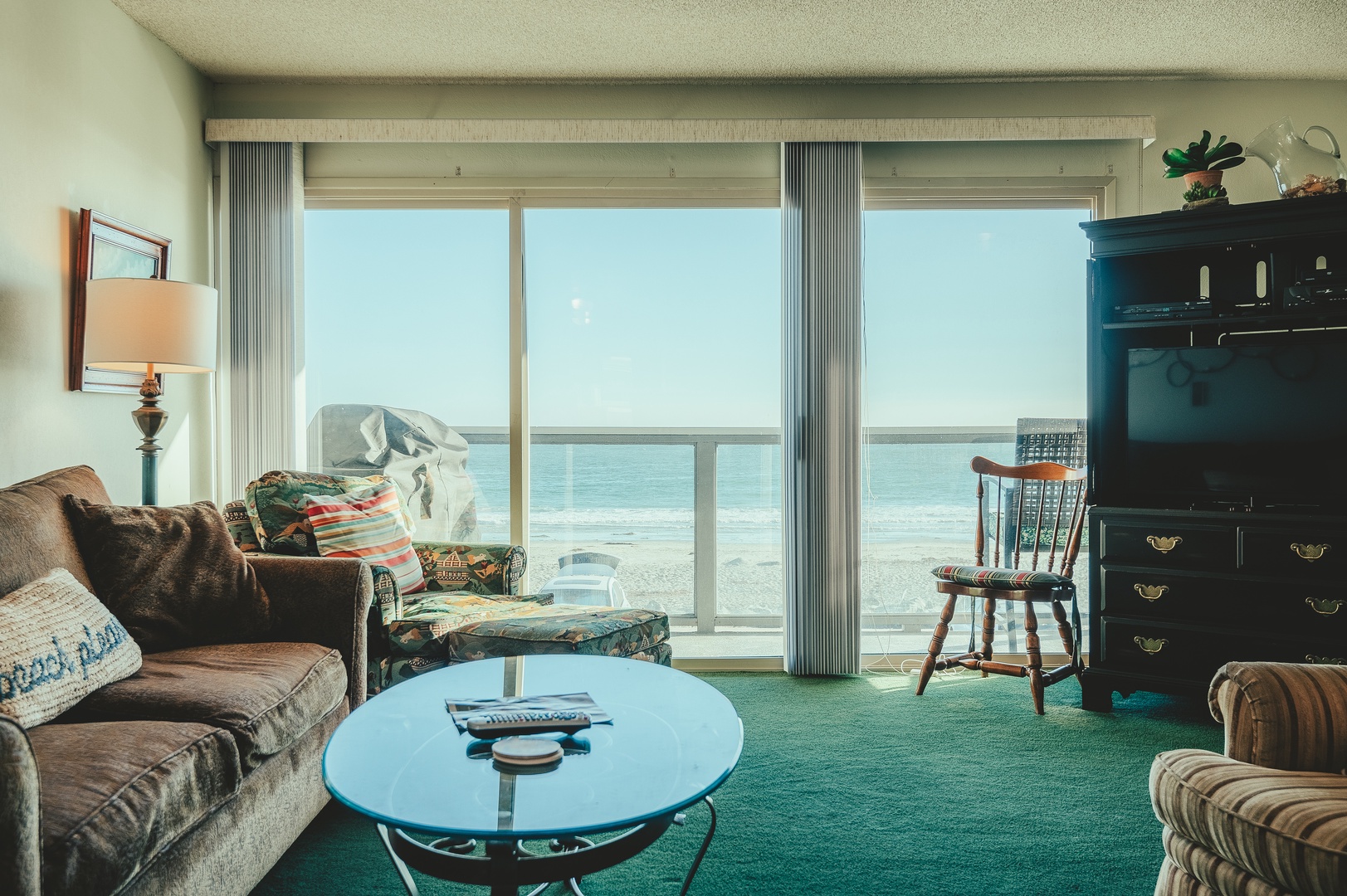 Enjoy stunning ocean views through floor-to-ceiling windows.