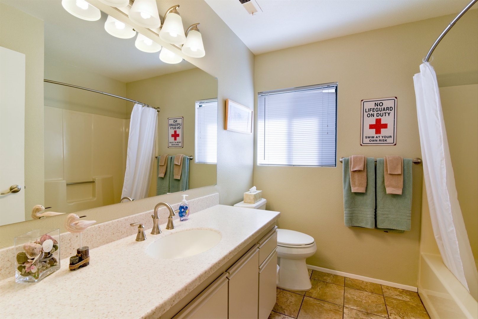 The second bath has a tub and shower