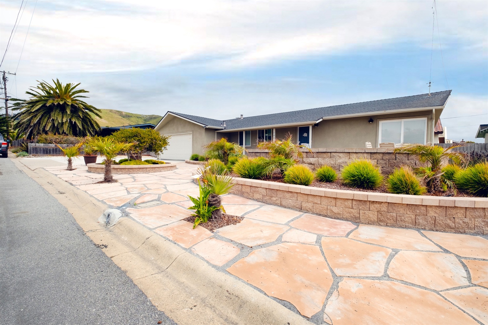 Well manicured and tastefully landscaped front yard.